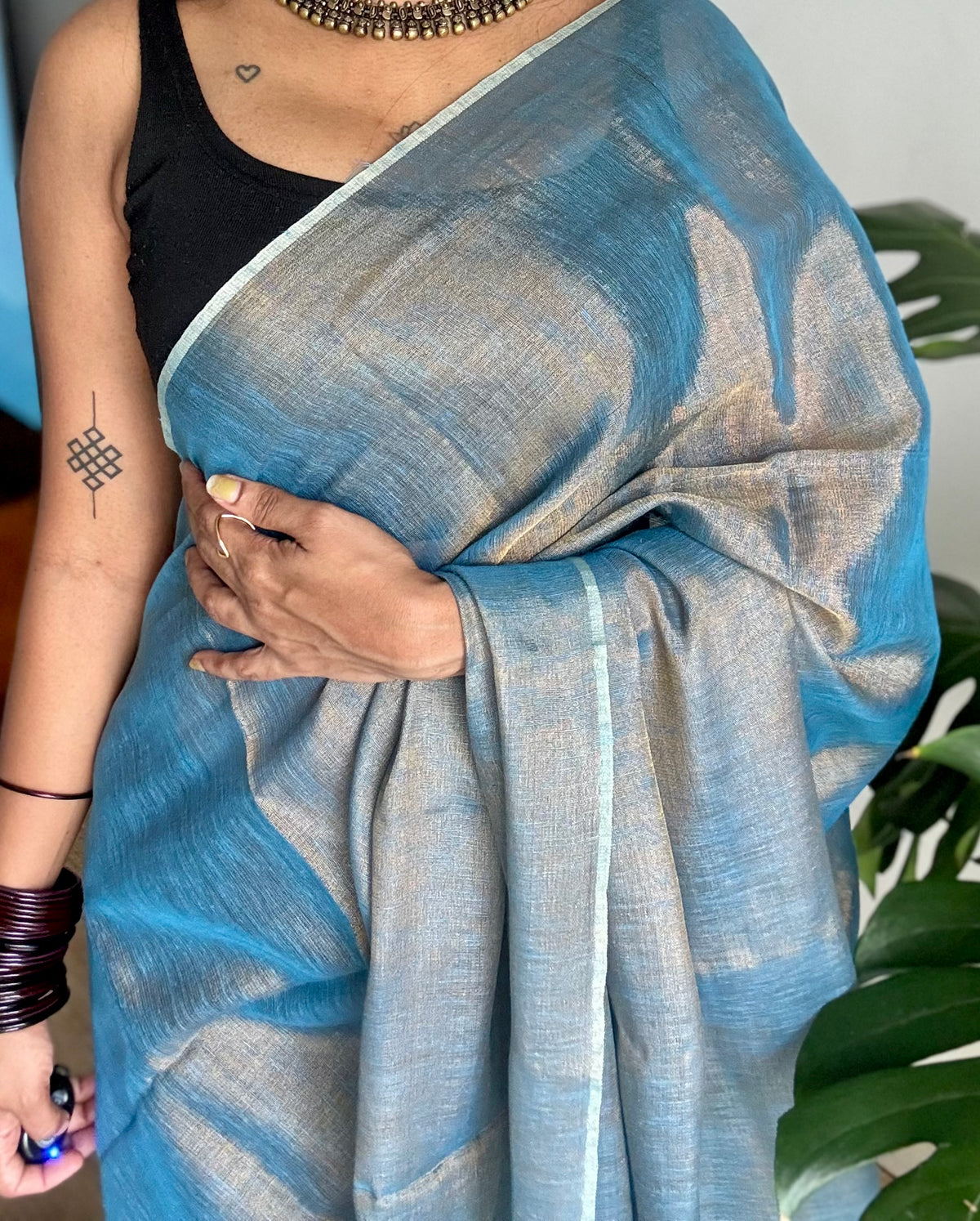 Teal blue with gold, dual tone metallic tissue linen saree - YCBCLTOC59