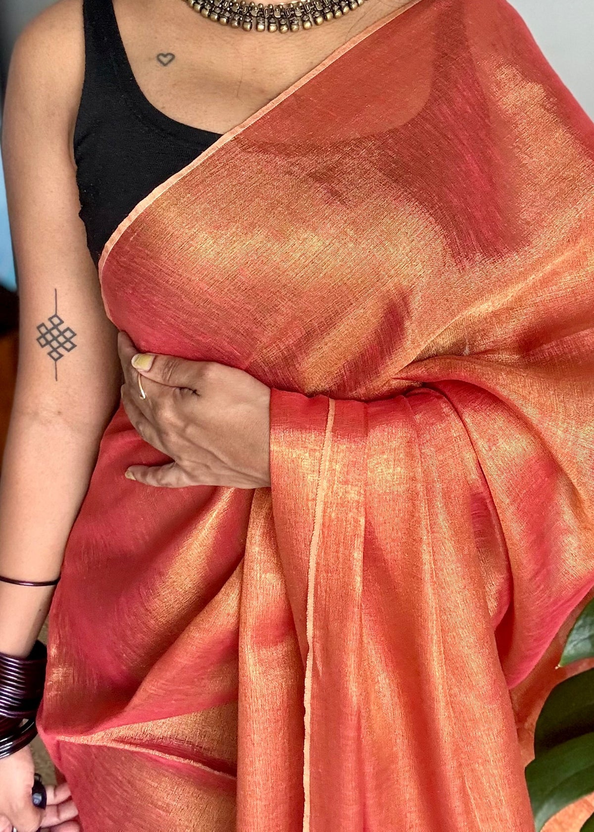 Orange with gold, dual tone metallic tissue linen saree - YCBCLTOC58