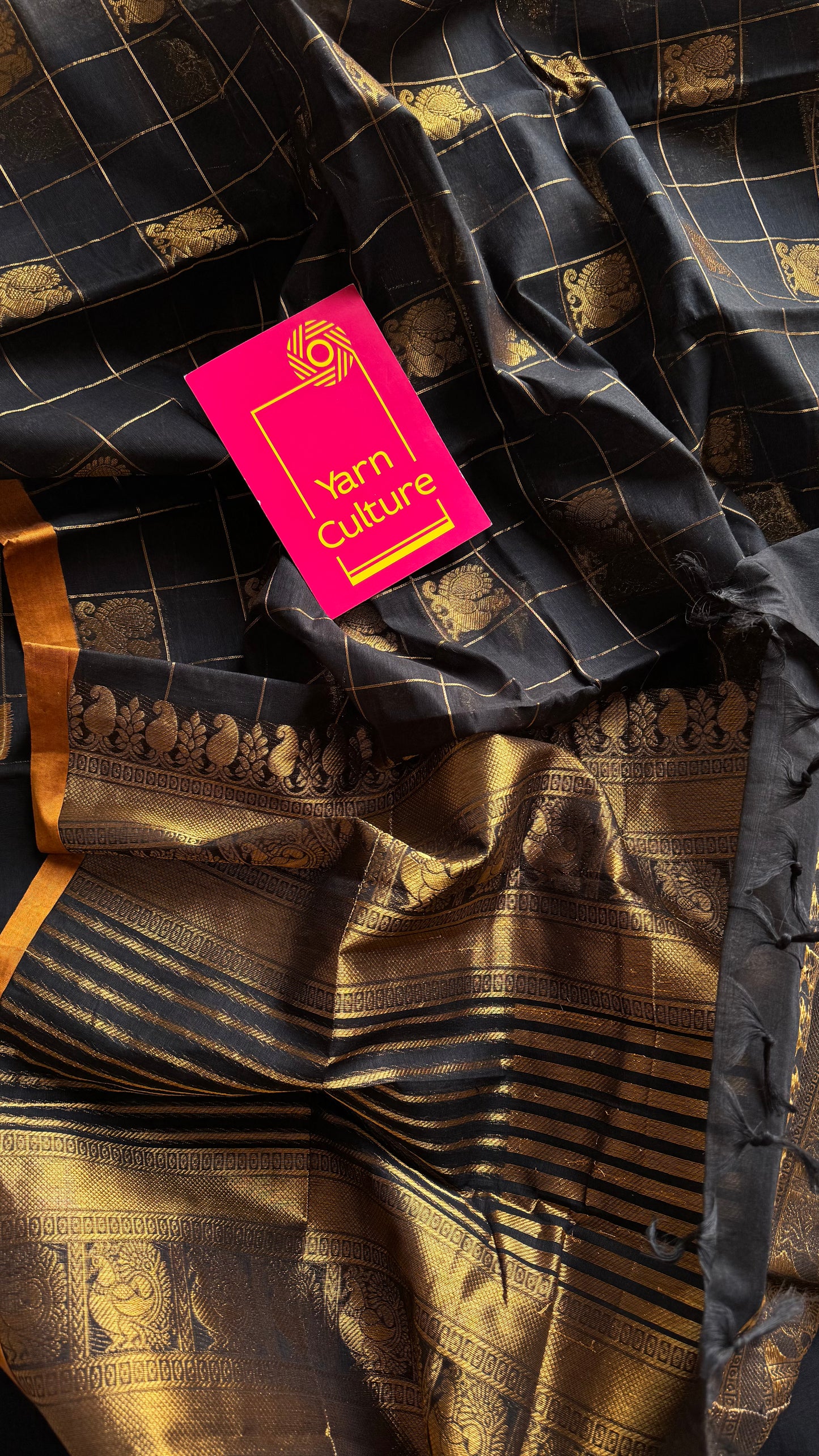 Black dual tone checks with peacock motifs, kanchi cotton saree - YCCOTNKCFE336