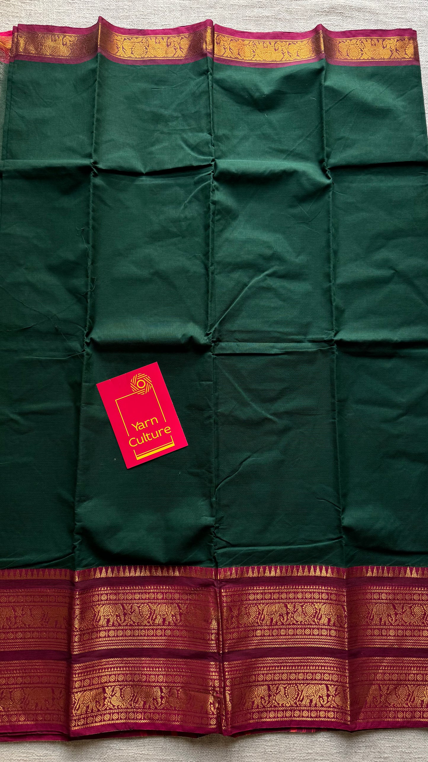 Dark green with magenta wide zari border, kanchi cotton - YCCOTNKCJA216
