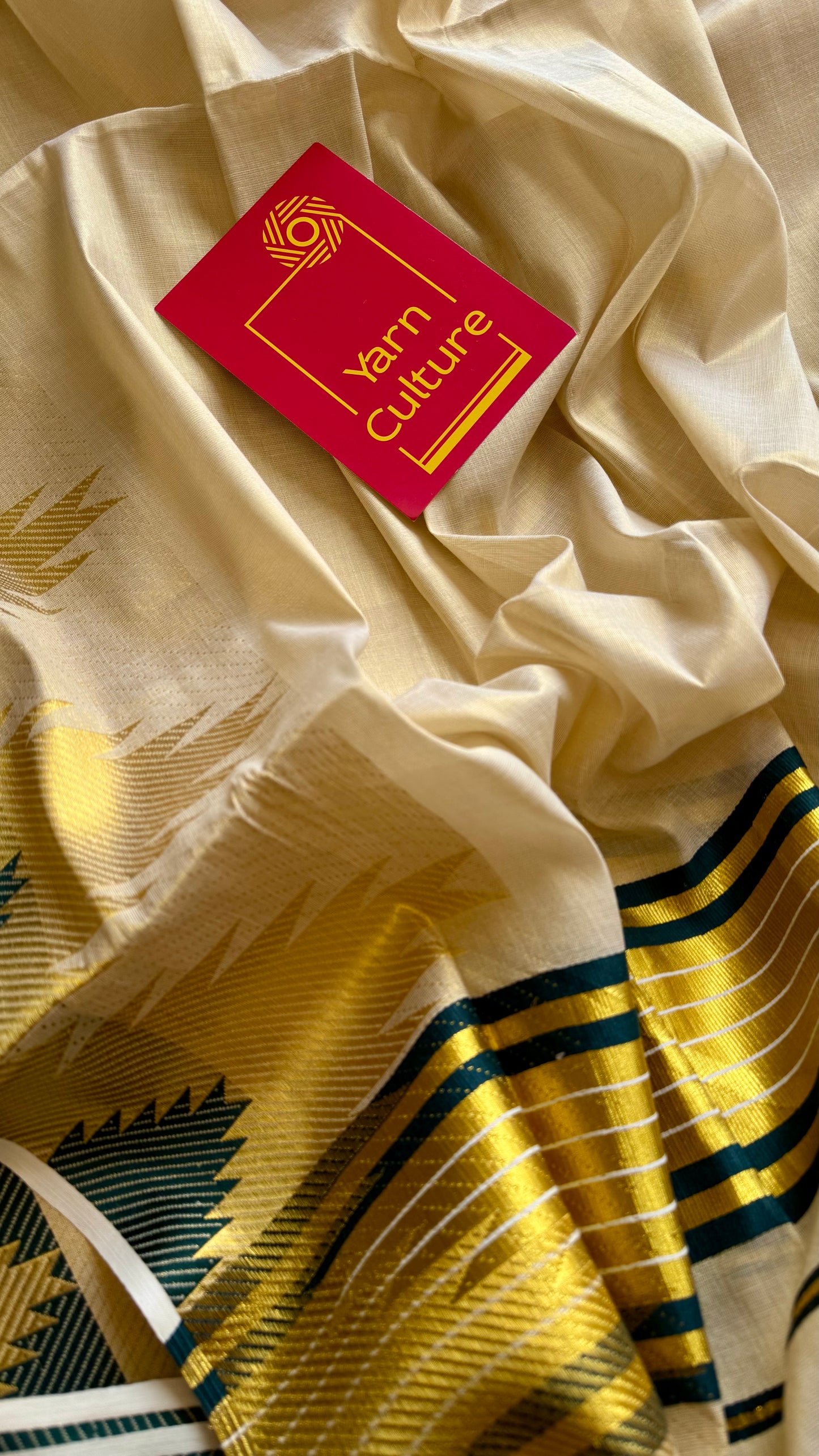 Ivory and gold kerala kasavu saree, dark green temple border - YCIEON47