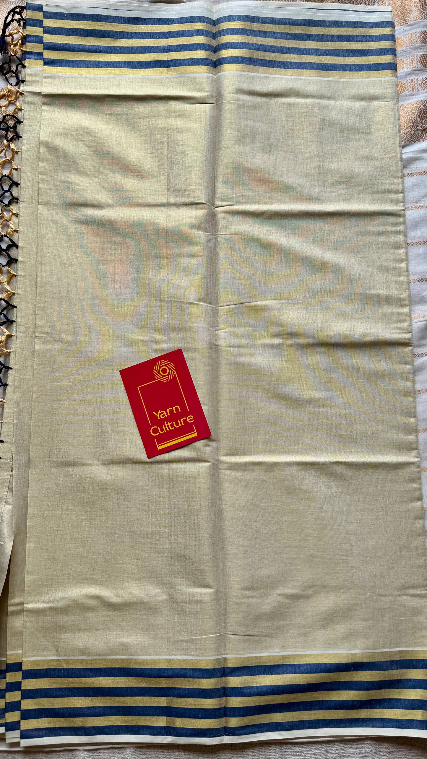 Ivory and gold soft tissue cotton saree, royal blue border - YCIEON66
