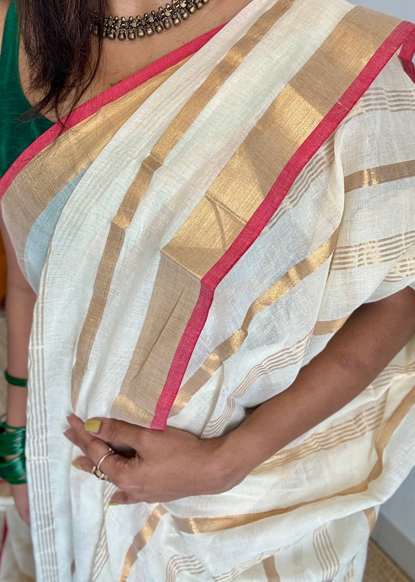 Ivory mul saree with gold stripes and red border - YCIEBCFE327