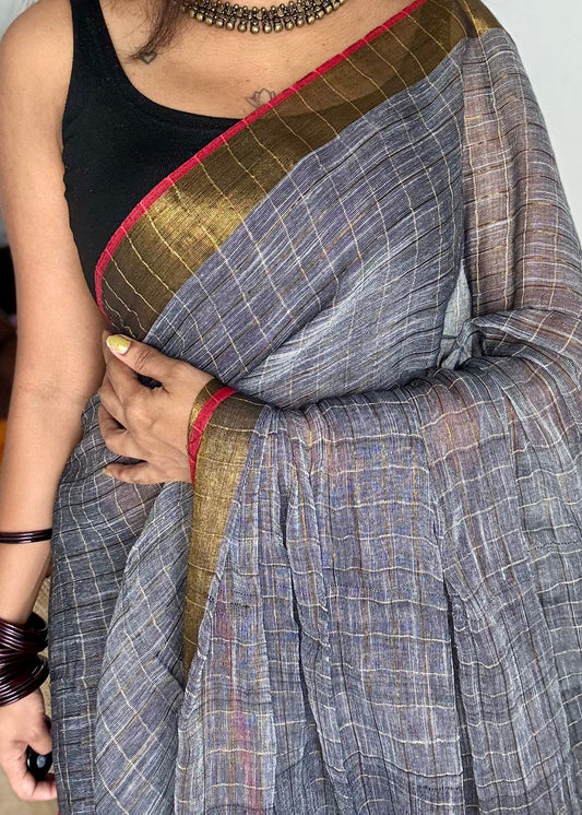 Grey linen by cotton saree, gold checks & gold zari pallu - YCBCLCFE388