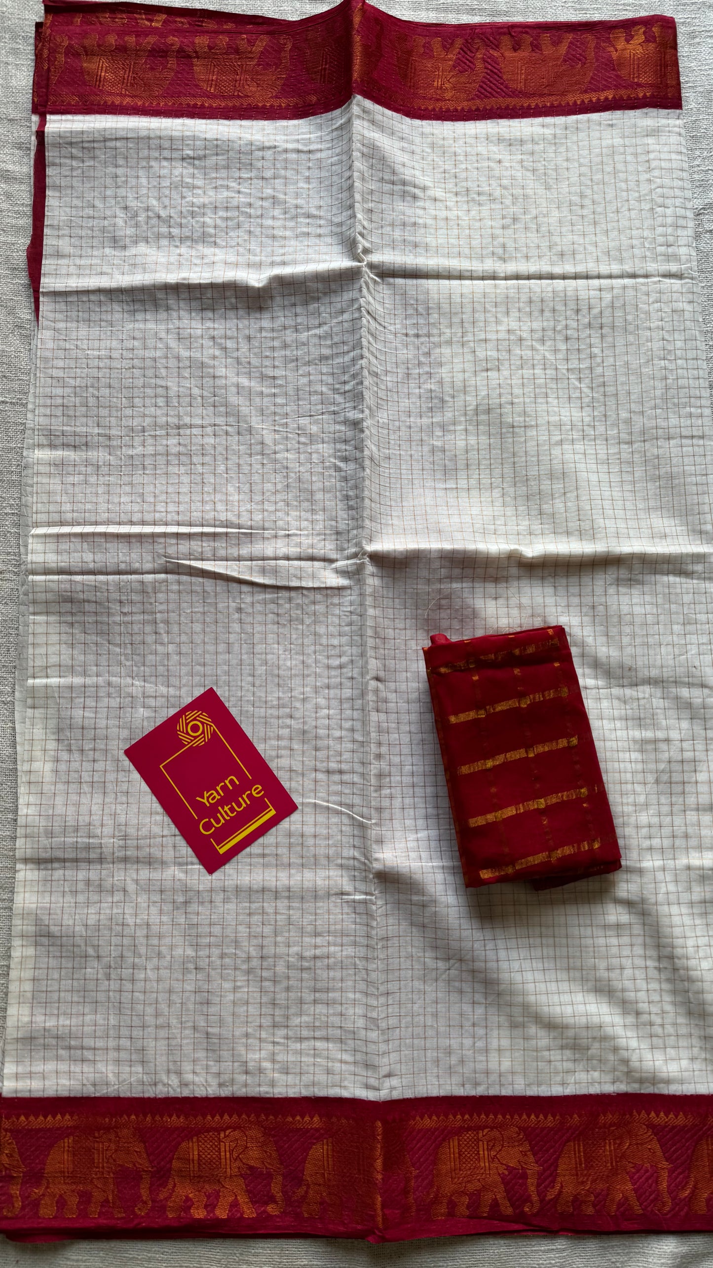 Sungudi cotton checks, ivory base, red border with elephant motifs, soft cotton - YCCOTNMSJA182