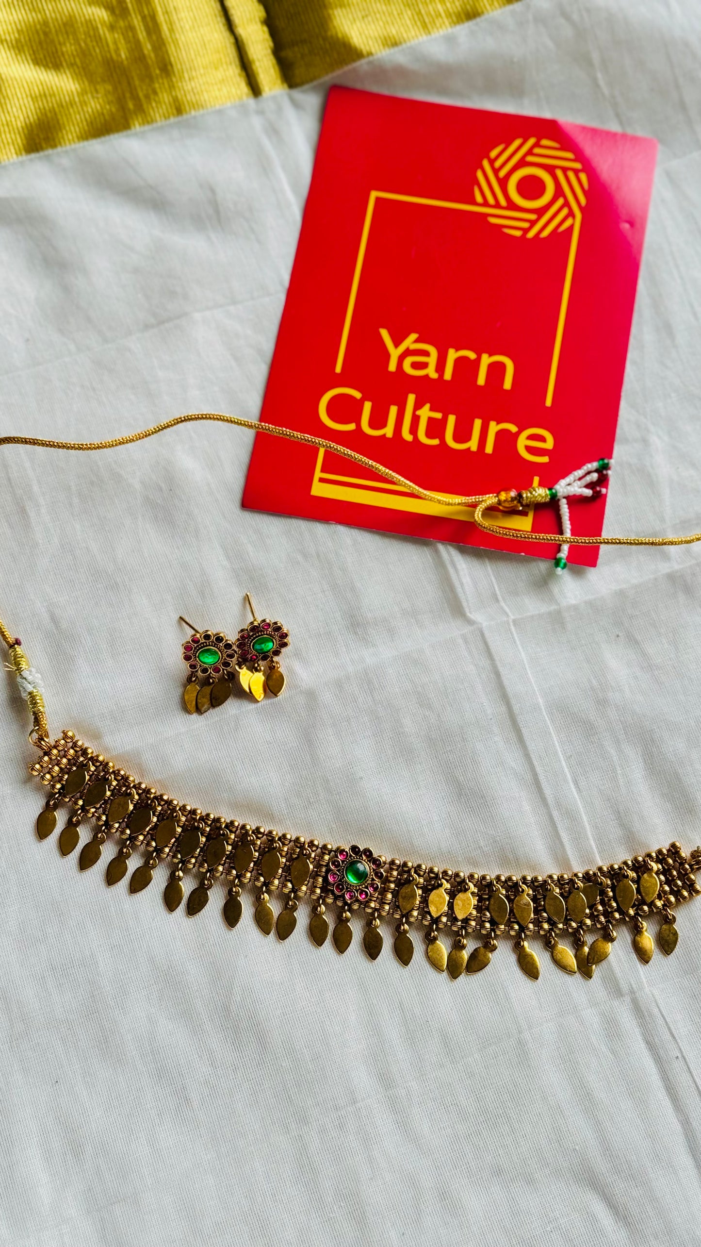 Elakkathali with ruby & green stones, with earrings - YCGPNP790