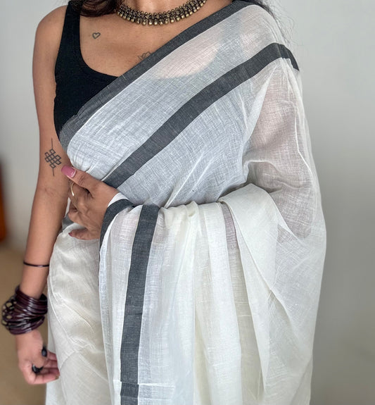 Ivory mul saree, black gap border - YCIEON157