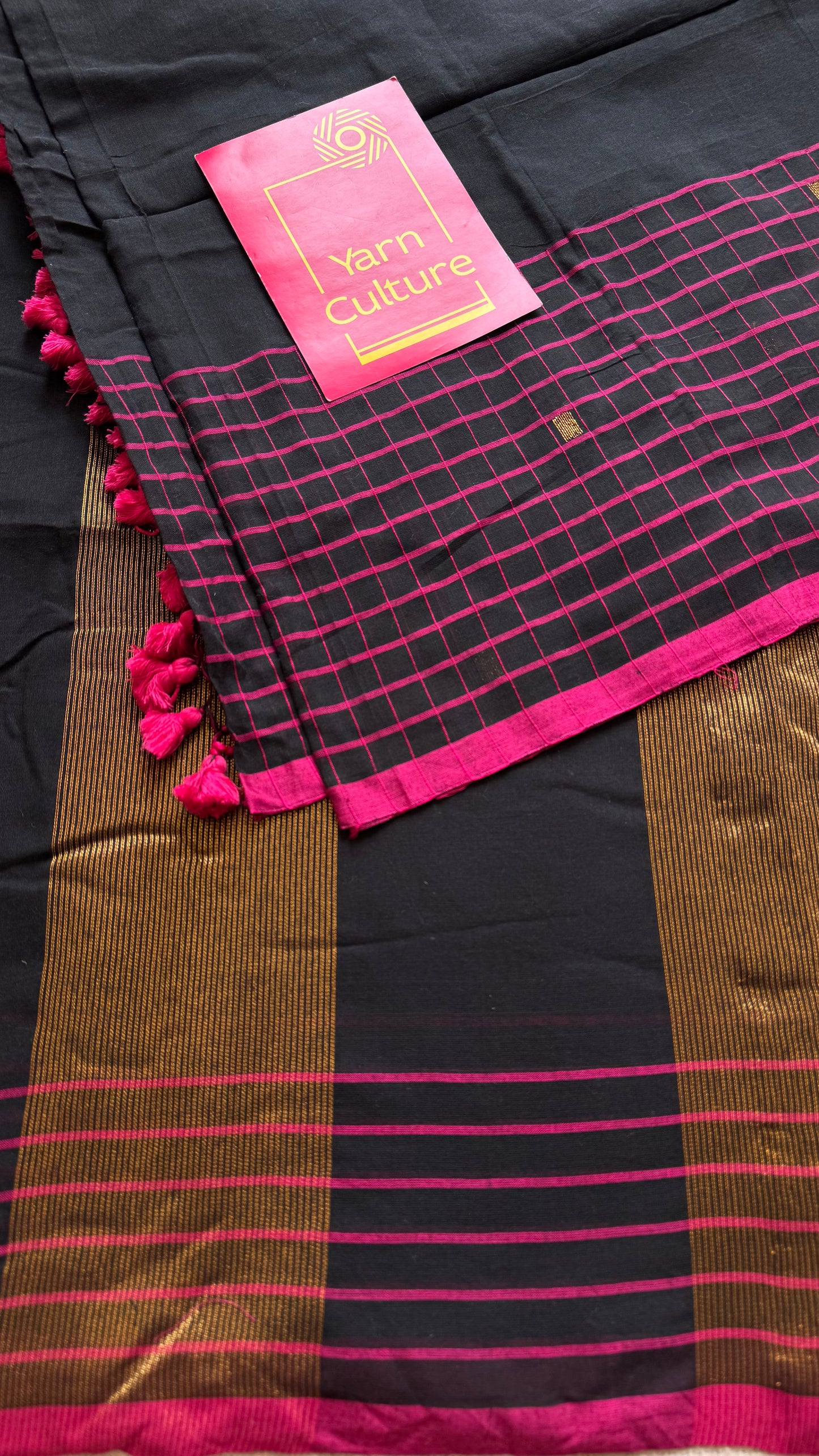 Black handloom mul saree with pink checkered borders and antique gold buttas - YCBCMCFE385