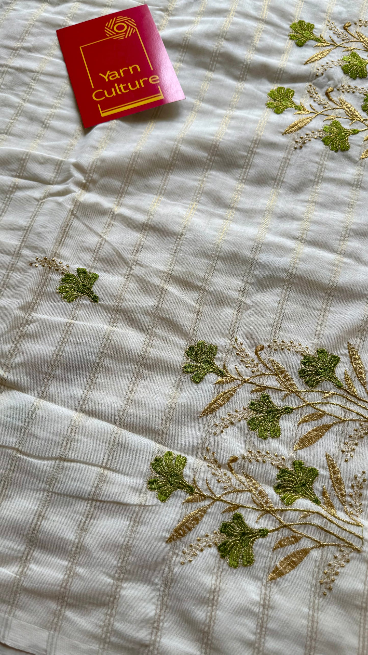 Ivory and gold soft cotton saree, light green floral embroidery  - YCIEON49