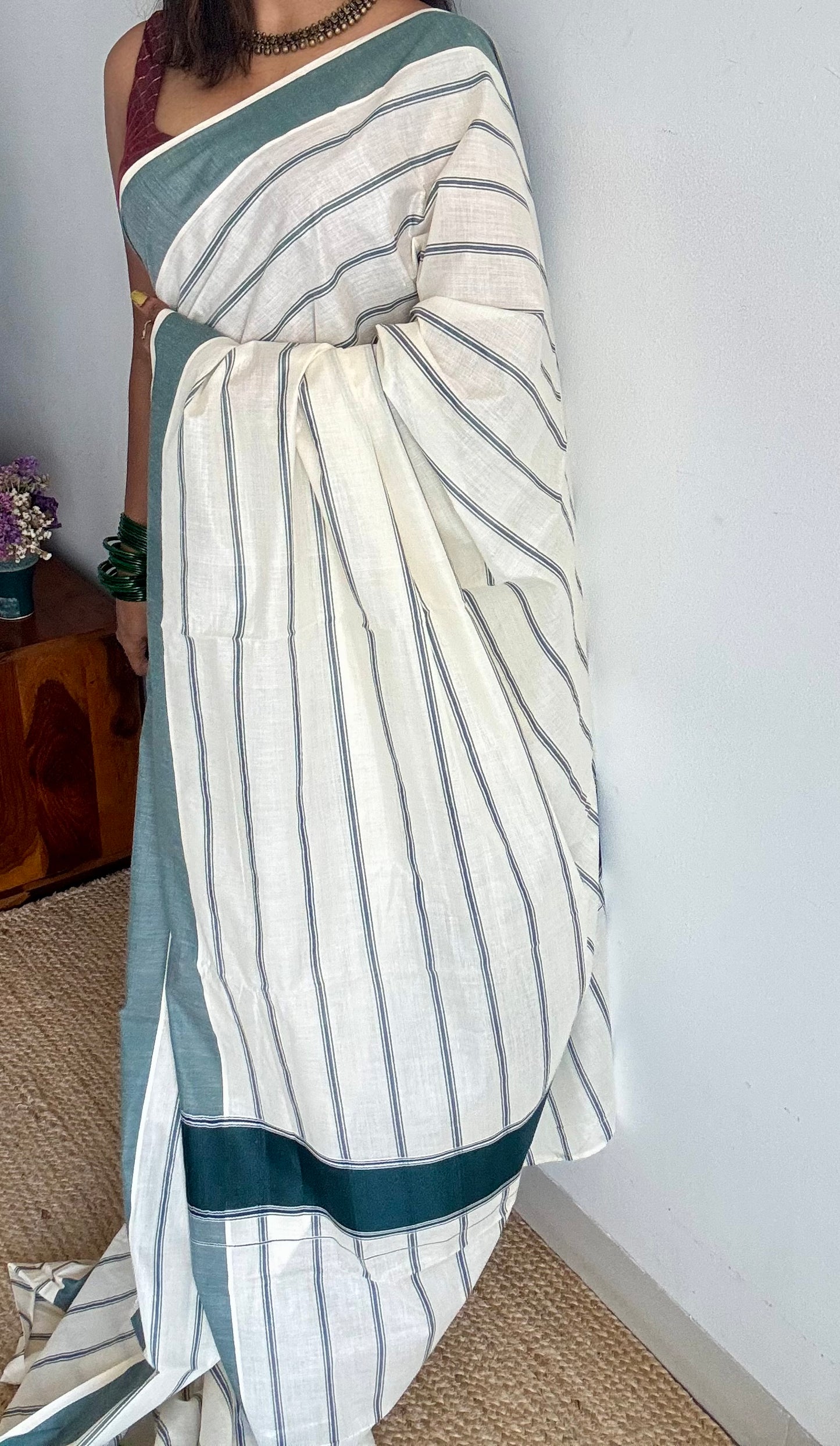 Ivory Kerala cotton saree with green stripes and border - YCIEKCFE323