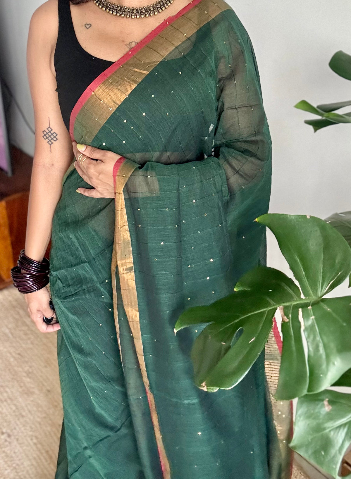 Dark green mul cotton saree with sequins and zari border - YCBCMCSE32