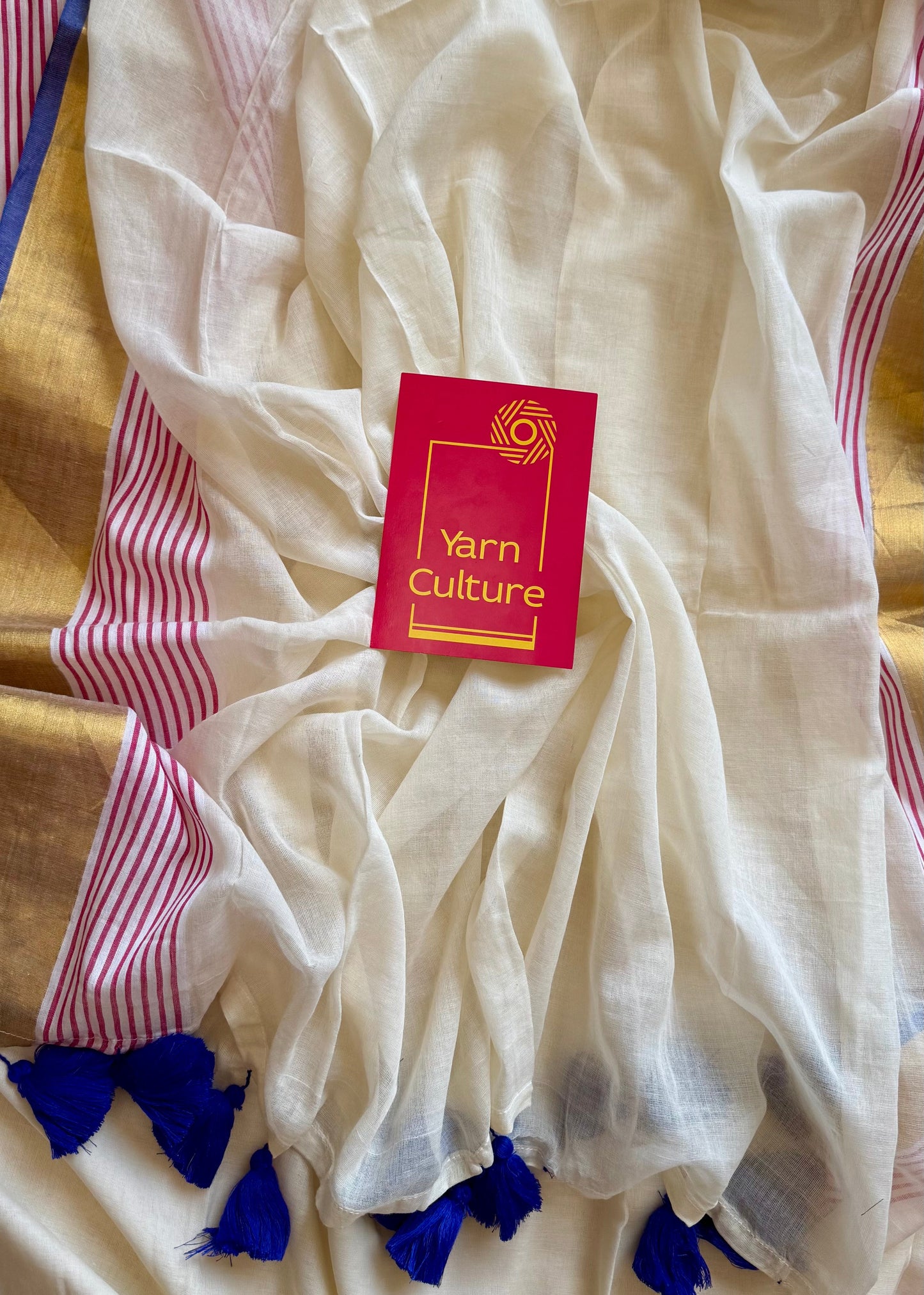 Ivory mul saree, blue and red striped border - YCIEON20