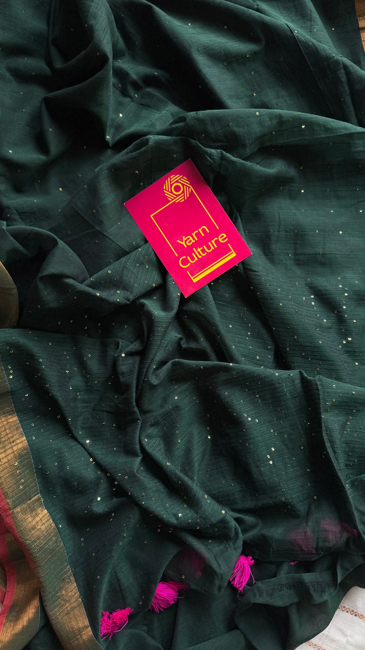 Dark green mul cotton saree with sequins and zari border - YCBCMCSE32