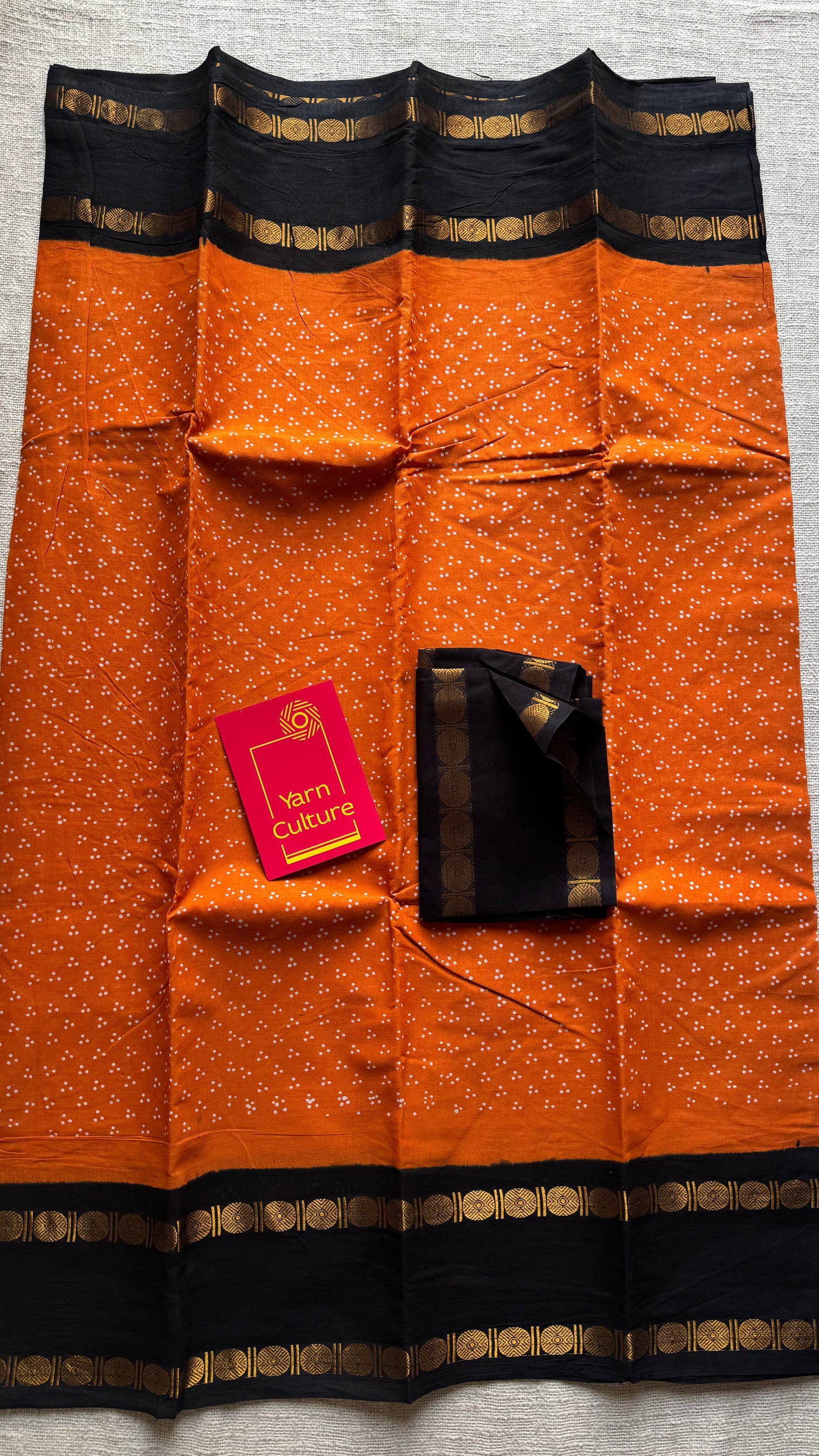 Orange with black contrast border, kattuchayam dyed madurai sungudi cotton saree - YCCOTNMSFE83