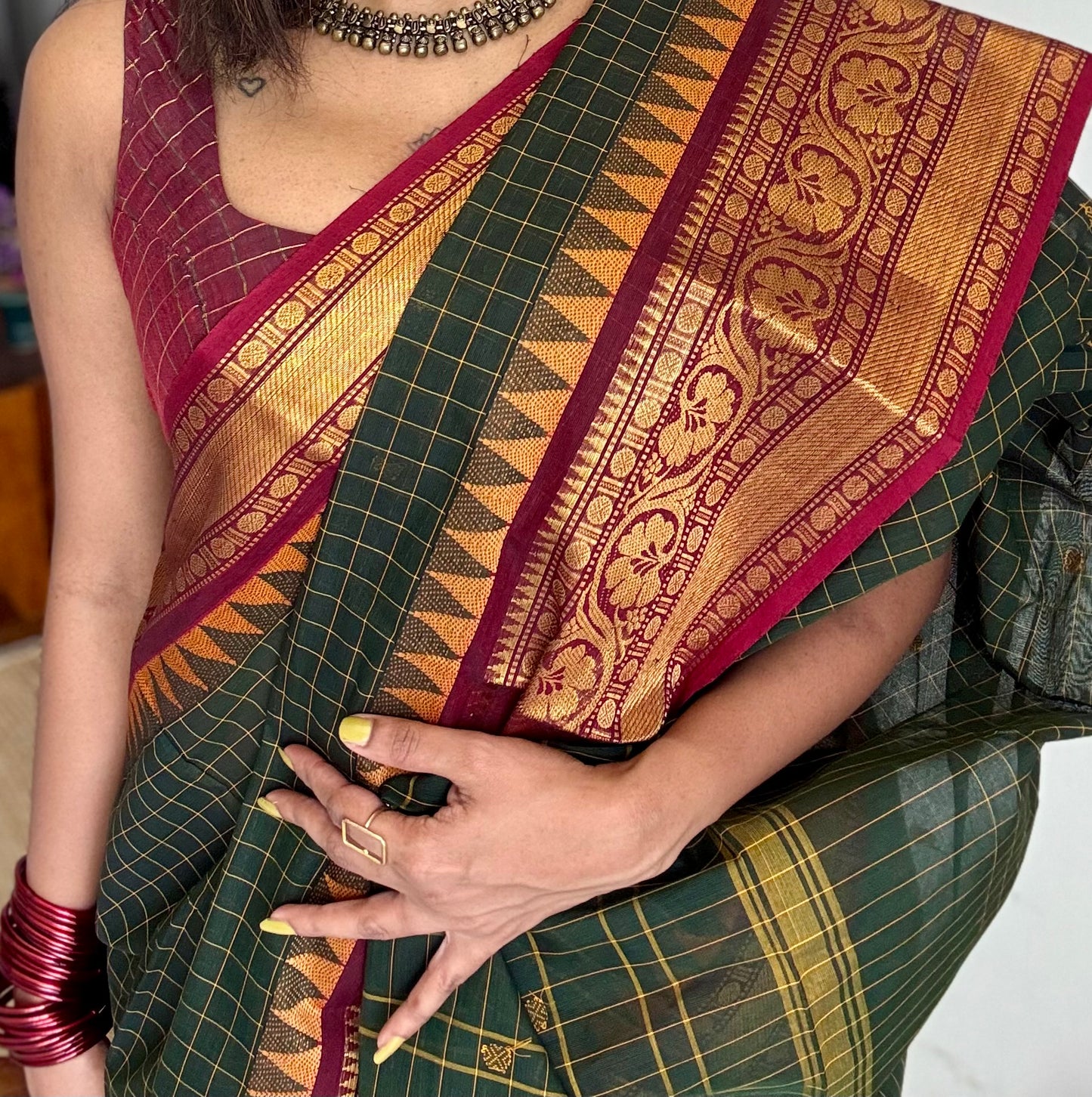 Dark green Kanchi cotton saree with checks, woven buttas and red zari border - YCCOTNCCFE161