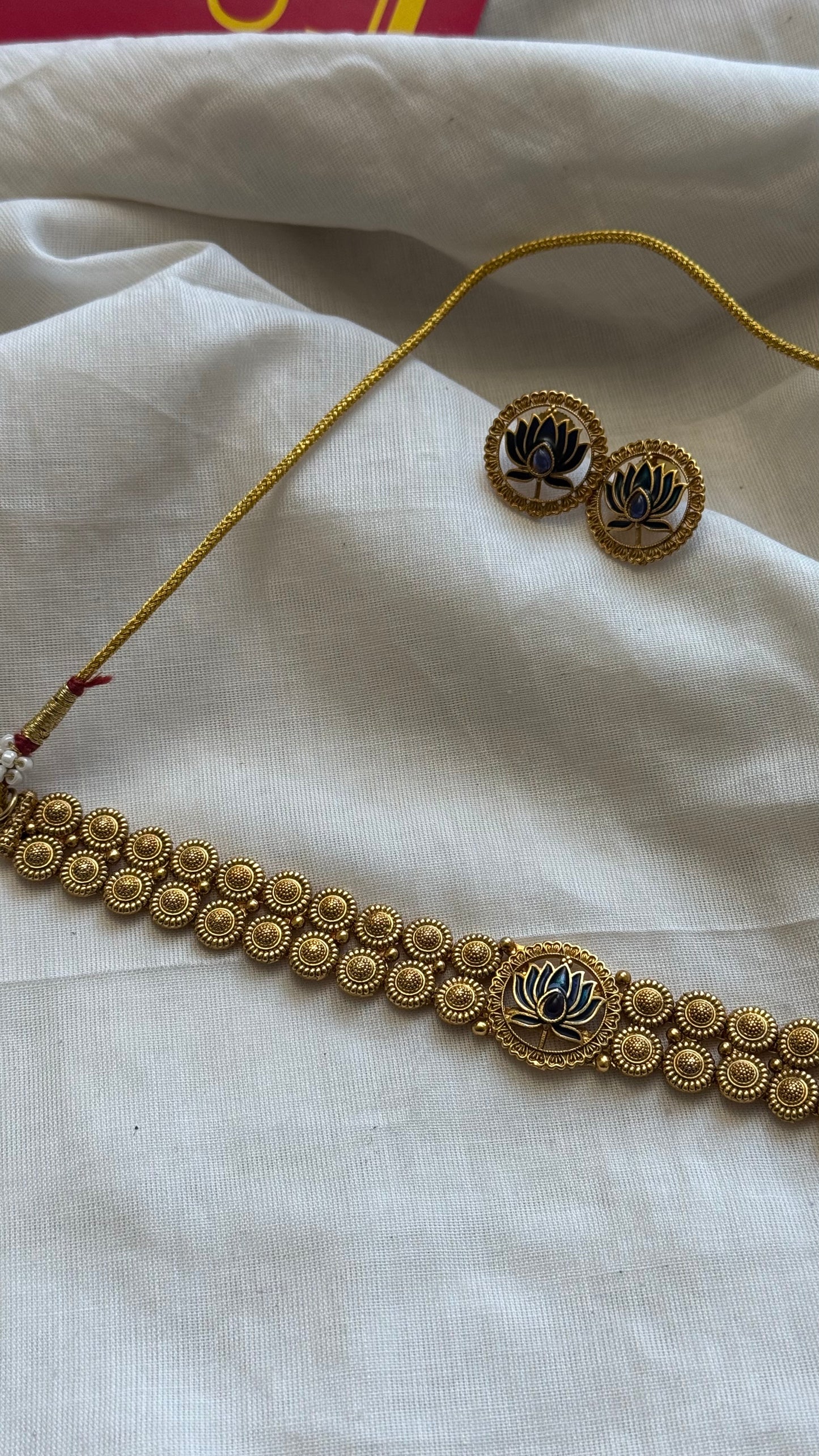 Double layered coin neckpiece with blue lotus pendant, with earrings - YCGPNP625