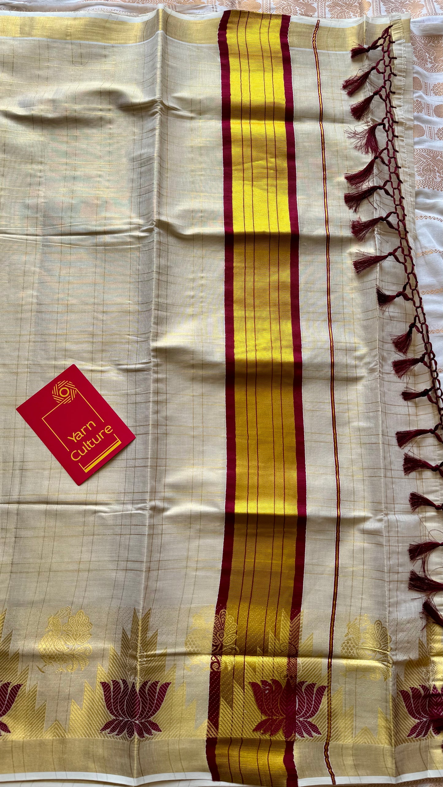 Ivory and gold kerala kasavu saree, maroon lotus motif border - YCIEON48