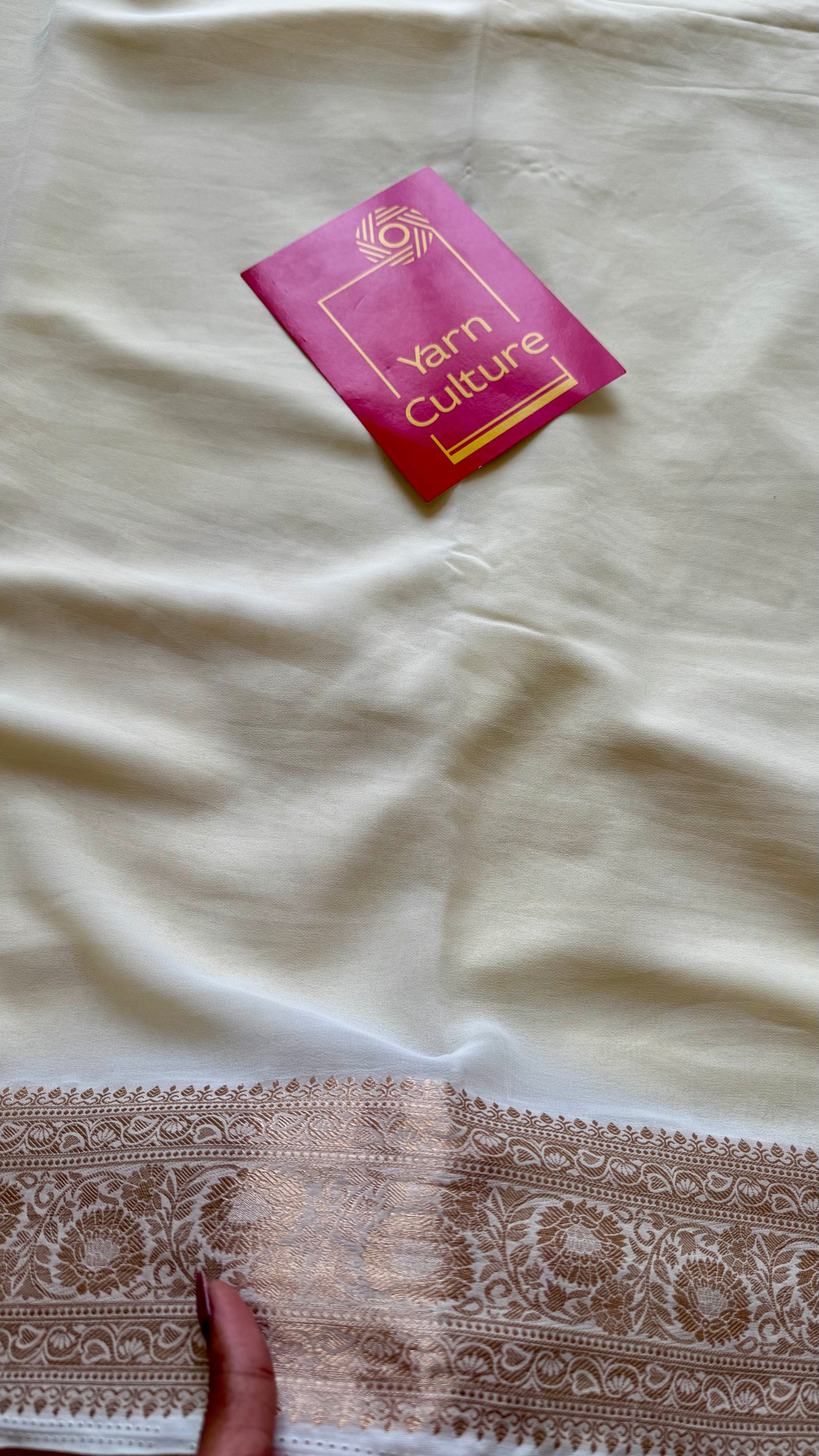 Ivory soft georgette saree, with antique gold zari border - YCIEON87