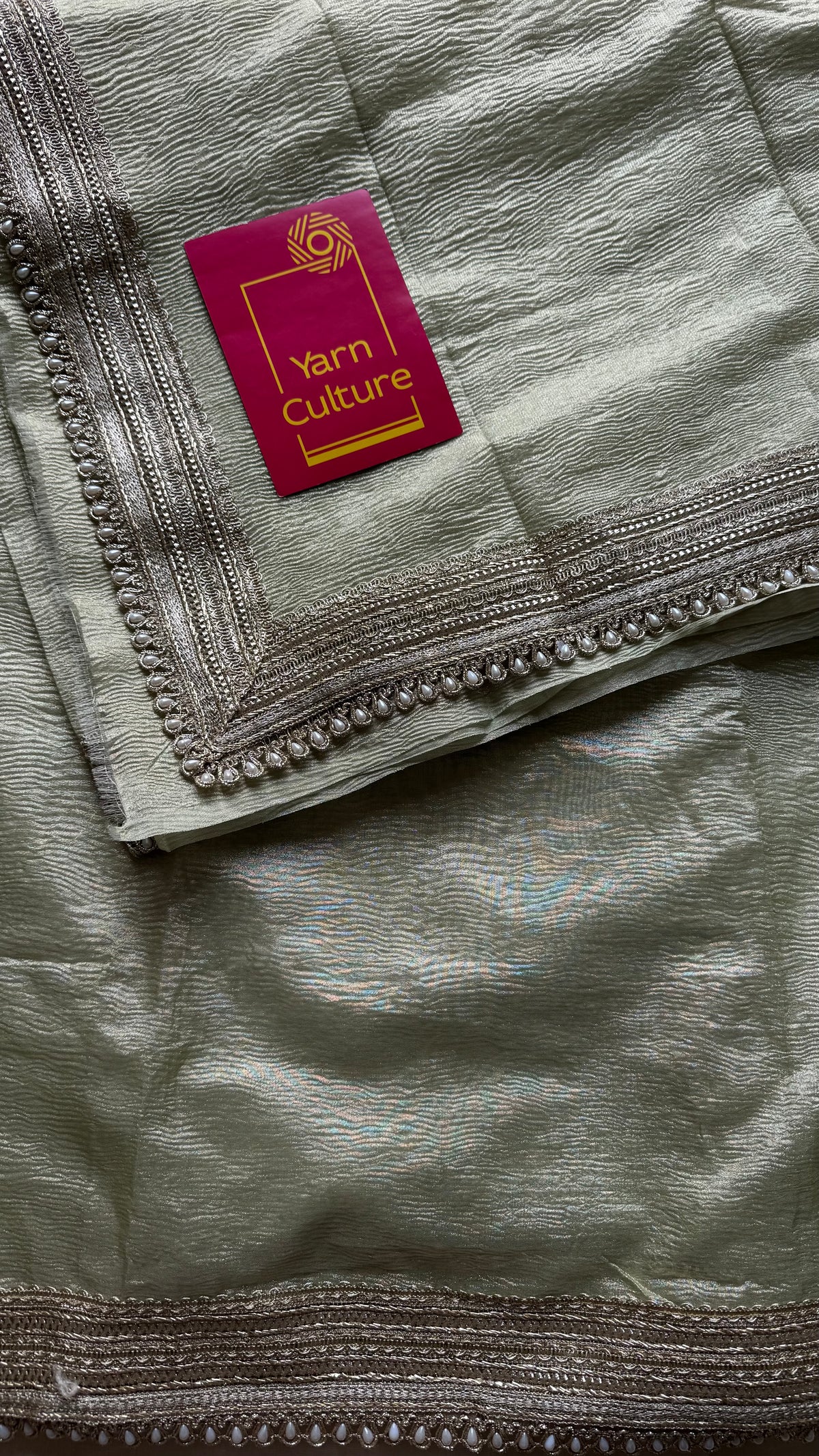 Pastel pista green crushed Banarasi tissue saree, with pearl lace border - YCBLTOC64