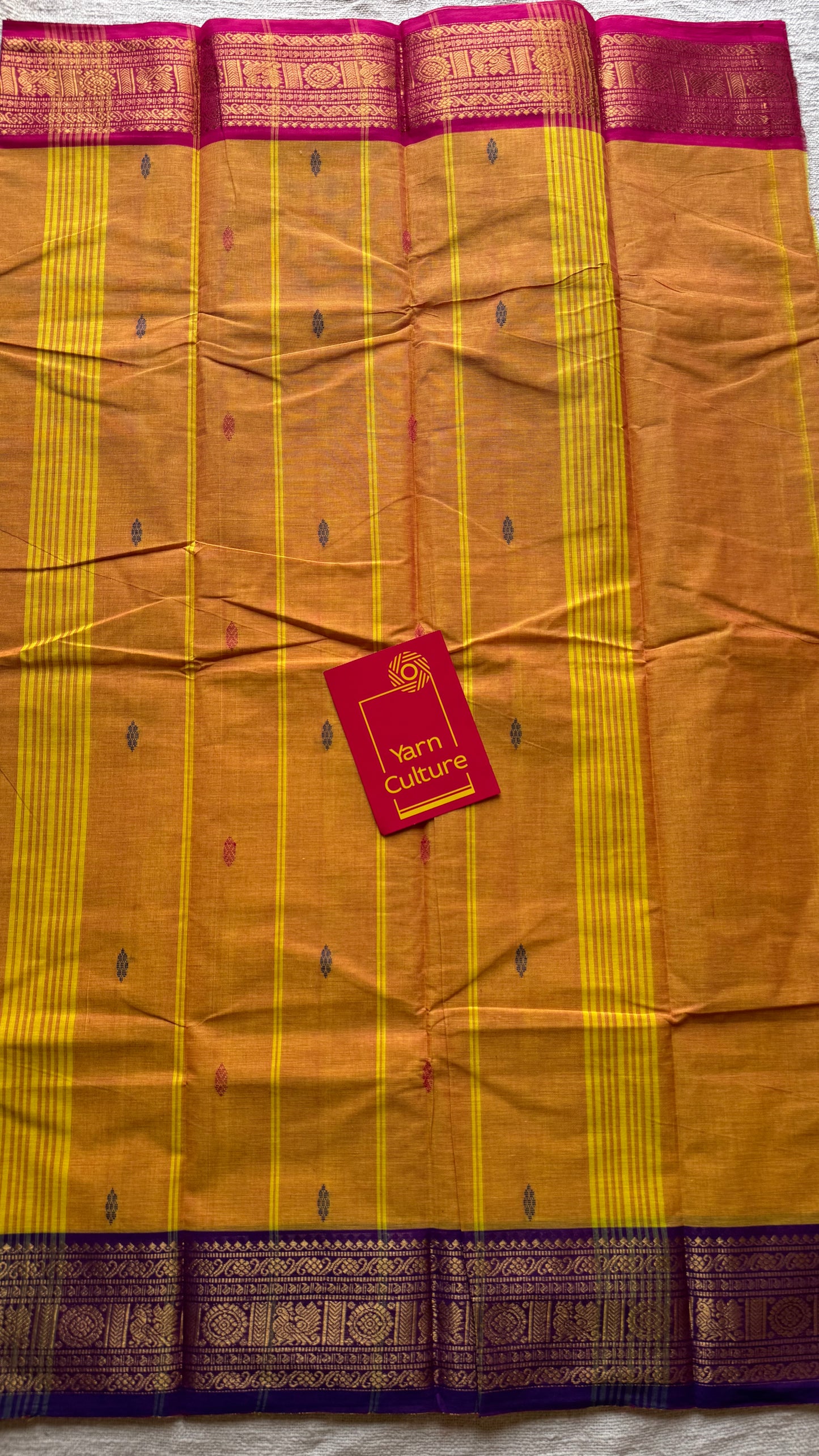 Light orange with hot pink and purple contrast, kanchi cotton saree - YCCOTNMA325