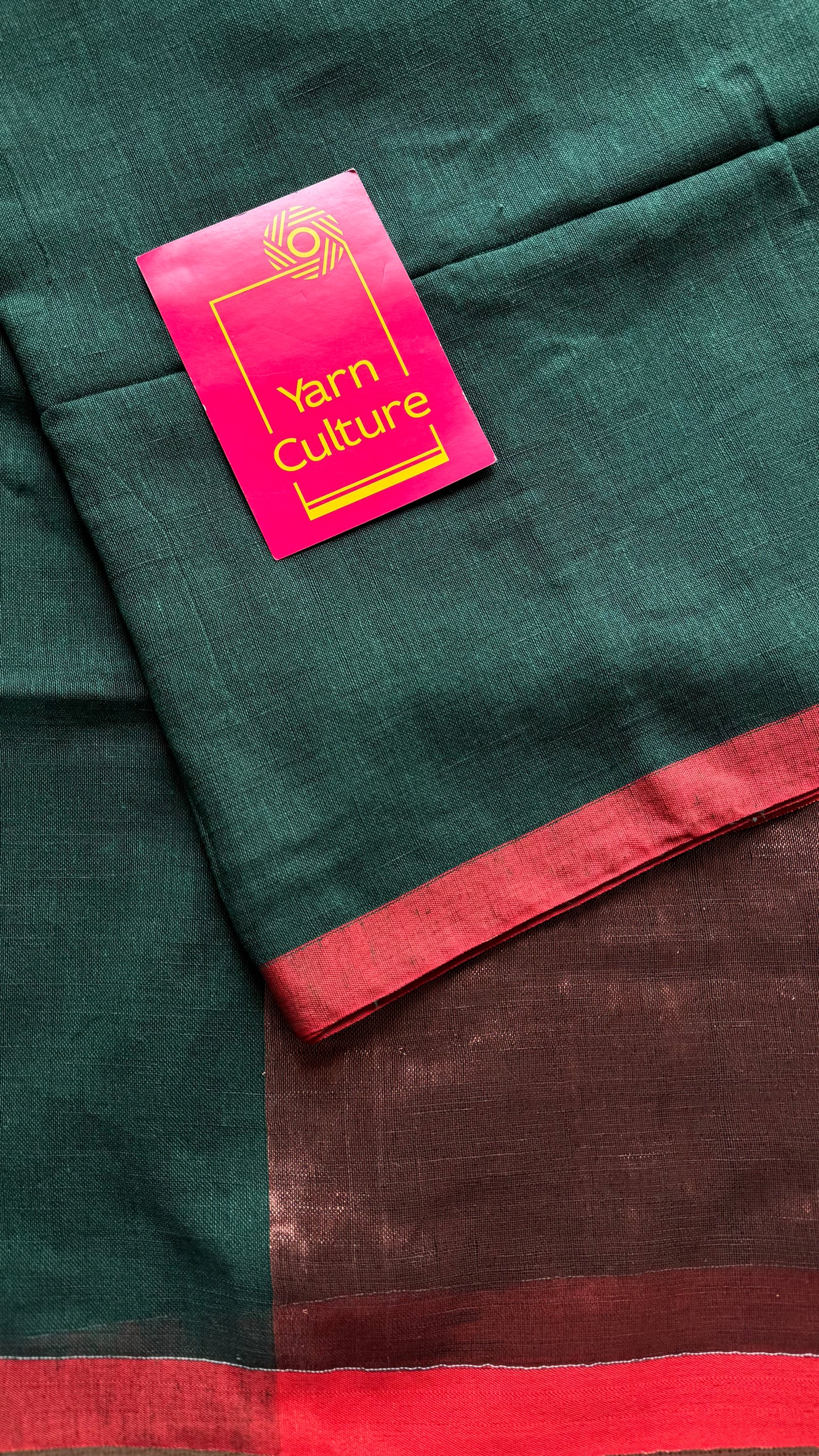 Dark green plain linen by cotton saree with copper zari pallu - YCBCLCFE397