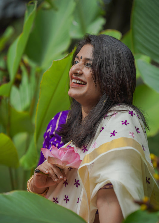 Anjana : Delicate purple and light pink flowers embroidered in soft Kerala cotton - YCONKCE156