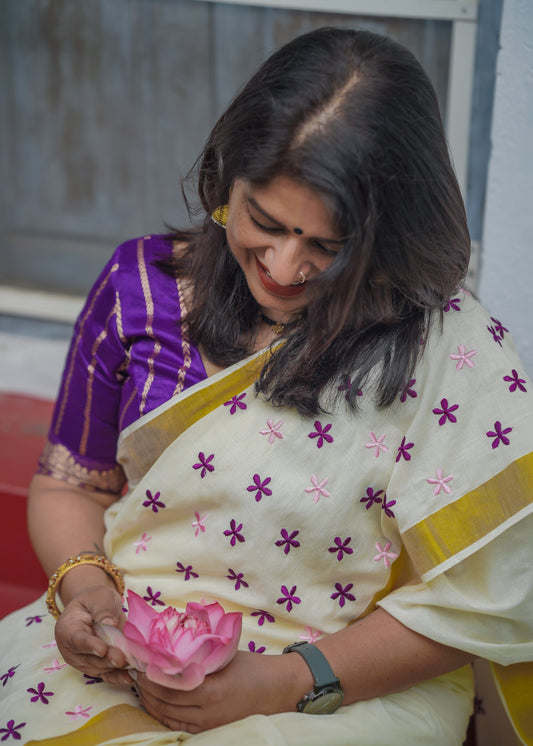 Anjana : Delicate purple and light pink flowers embroidered in soft Kerala cotton - YCONKCE156