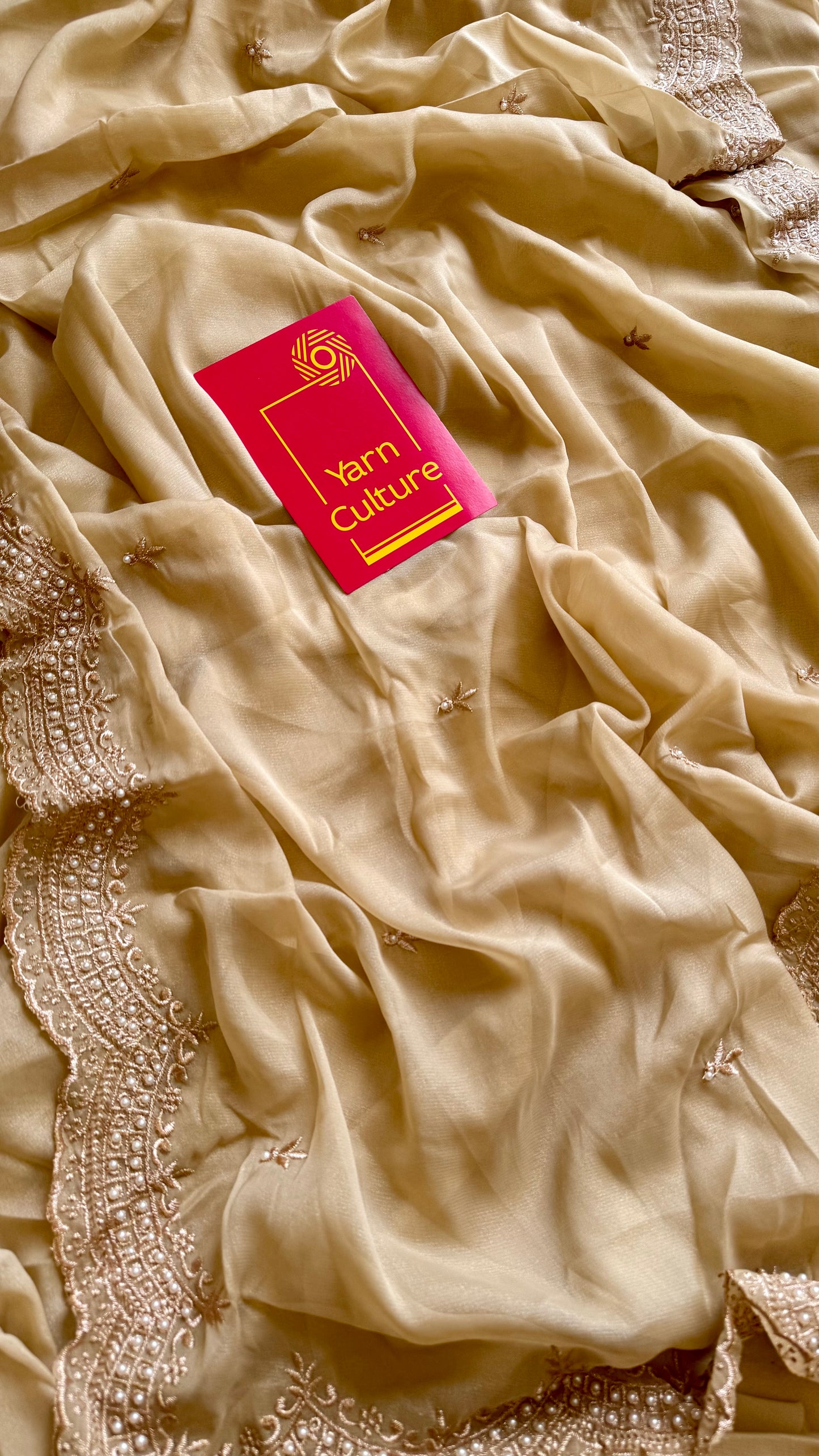 Gold soft chiffon saree, with pearl embellished border - YCIEON85