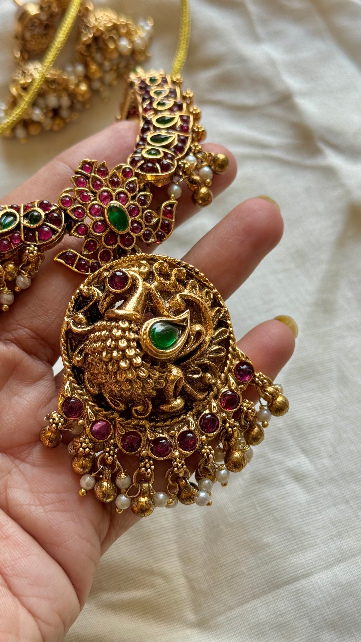 Kemp stones, peacock pendant necklace with jhumkas - YCGPNP469