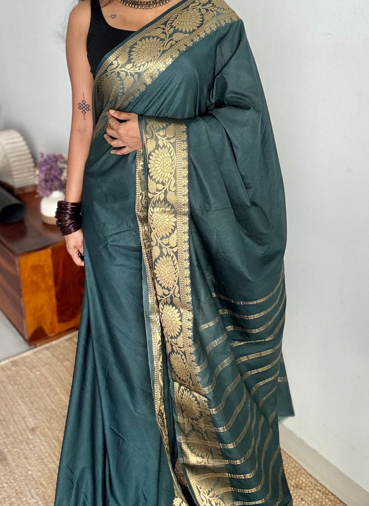 Dark green, semi crepe silk saree with antique gold floral border - YCLOKOC57