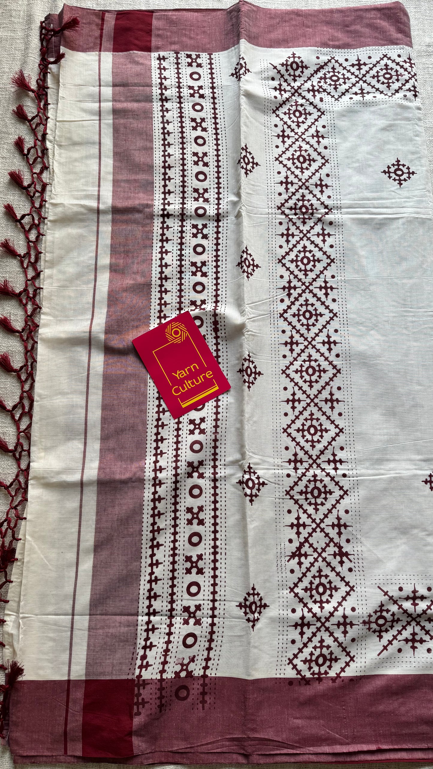 Ivory Kerala cotton saree with maroon Kutch-inspired printed borders and maroon centre pleats - YCIEKCFE313