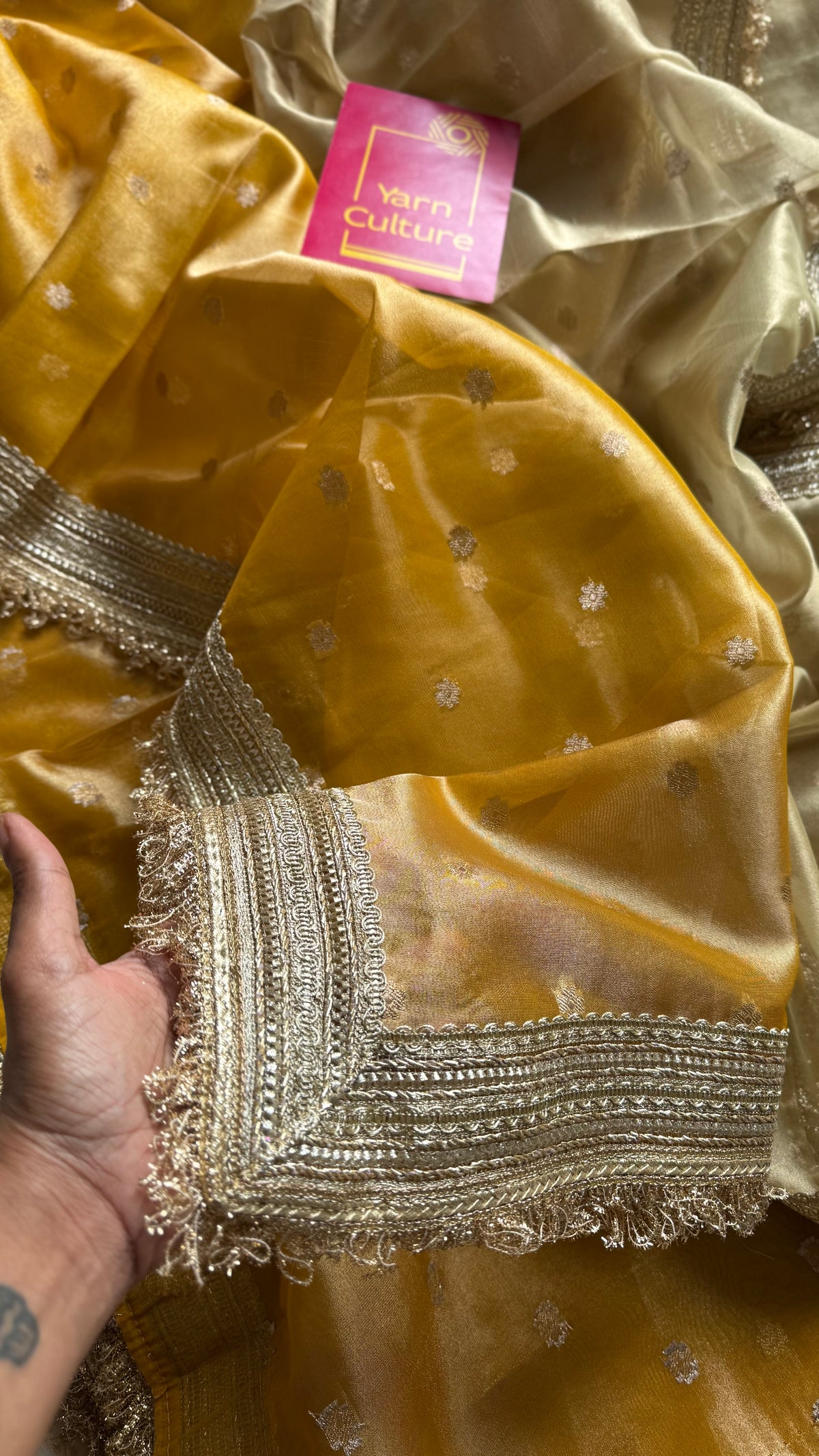 Light gold and dark gold Banarasi tissue saree, with buttas and embellished lace border - YCBLTOC65