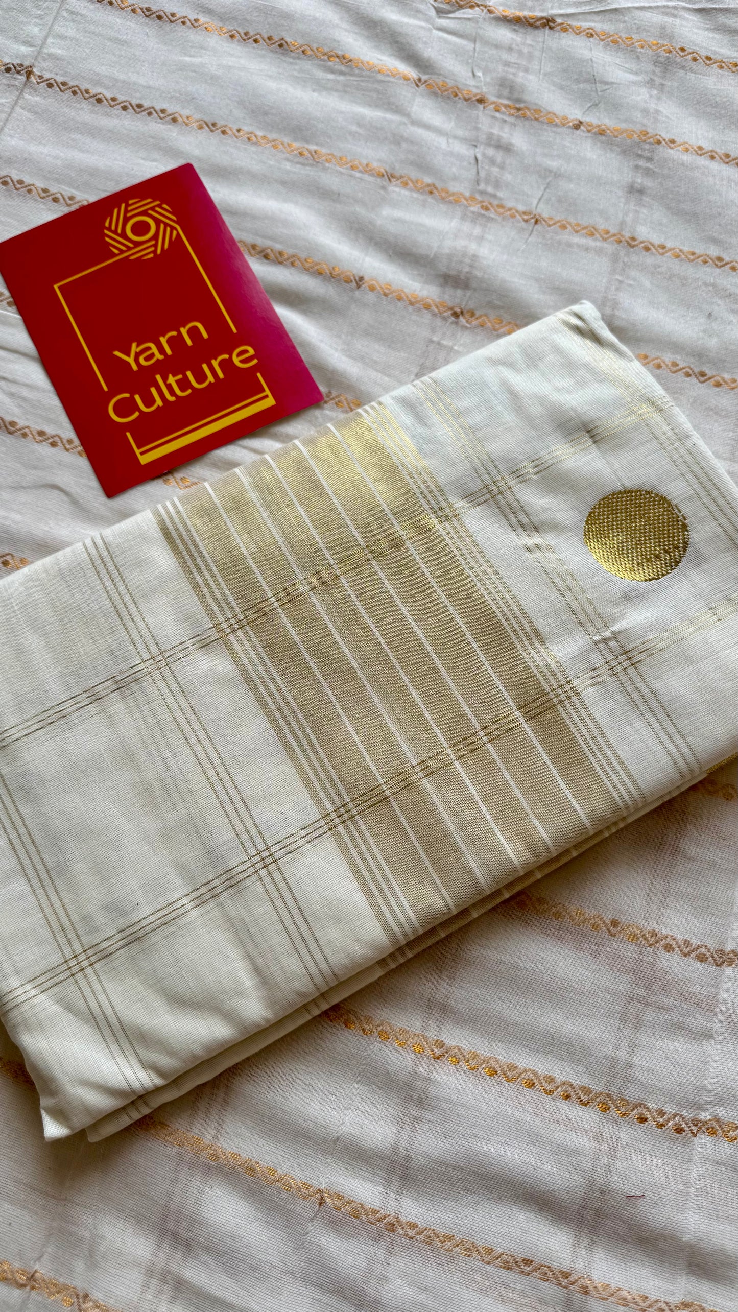 Ivory and gold kerala saree with gold buttas and checks - YCIEON41