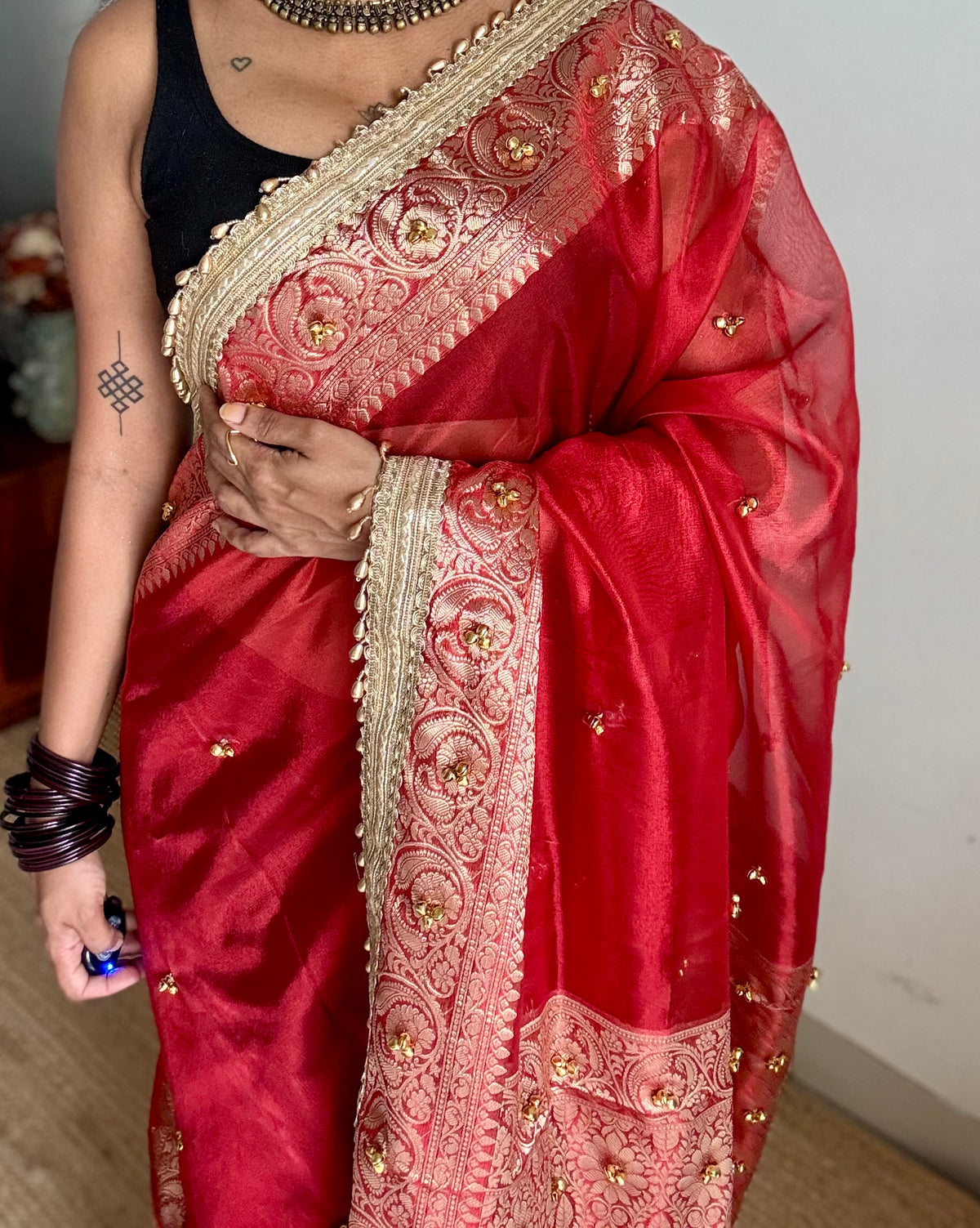 Red gold tissue Banarasi saree with ghungroo embellishments and beaded lace zari border - YCBLTOC69