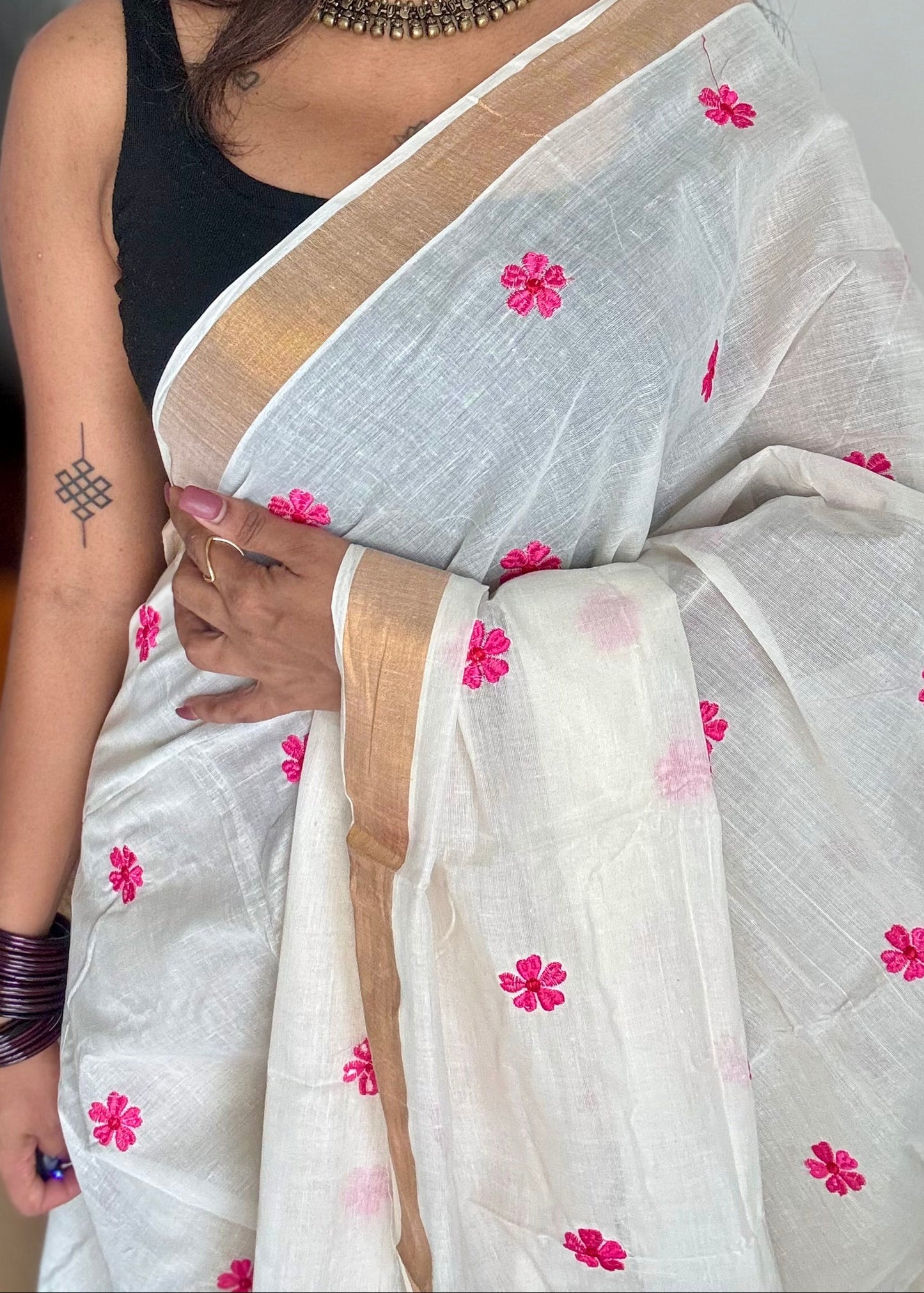 Ivory and antique gold soft cotton kasavu saree, pink parijat floral embroidery - YCIEON155