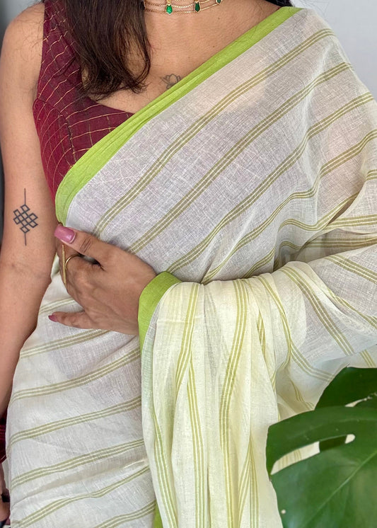 Ivory mul saree, green stripes - YCIEON23
