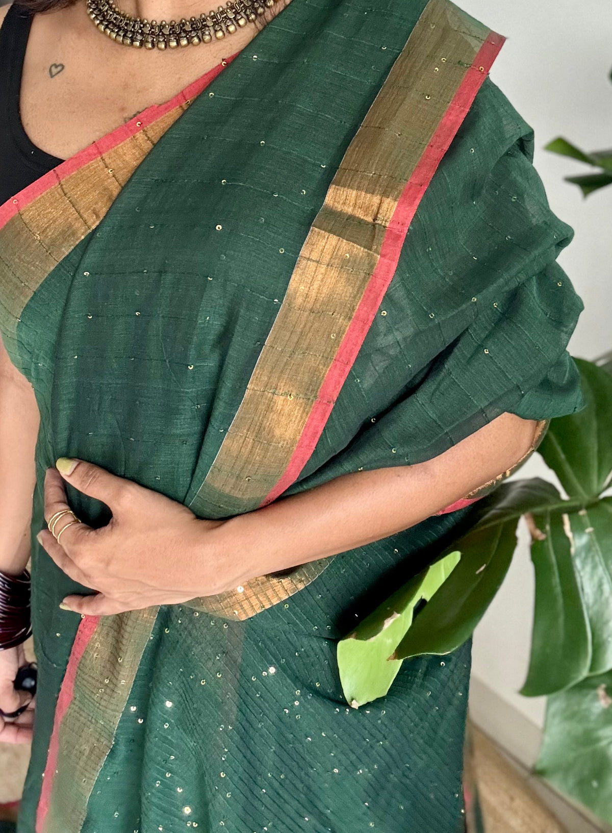 Dark green mul cotton saree with sequins and zari border - YCBCMCSE32