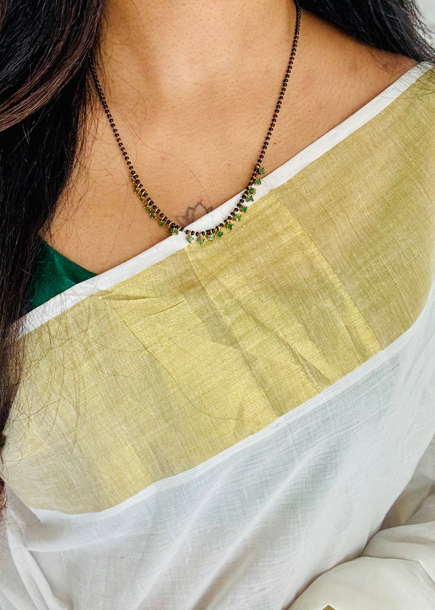 Black beaded (karimani) neckchain with green stone pendants, with earrings - YCGPNP809