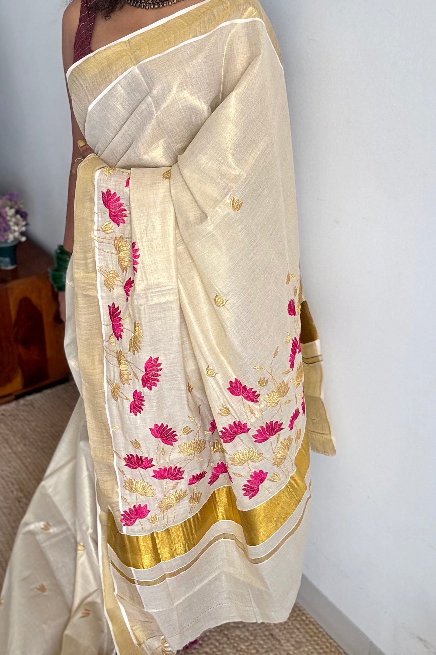 Ivory and gold tissue kerala cotton saree with hot pink and gold lotus embroidery - YCIEKCFE315