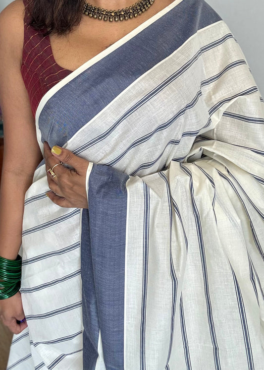 Ivory Kerala cotton saree with blue stripes and border - YCIEKCFE320