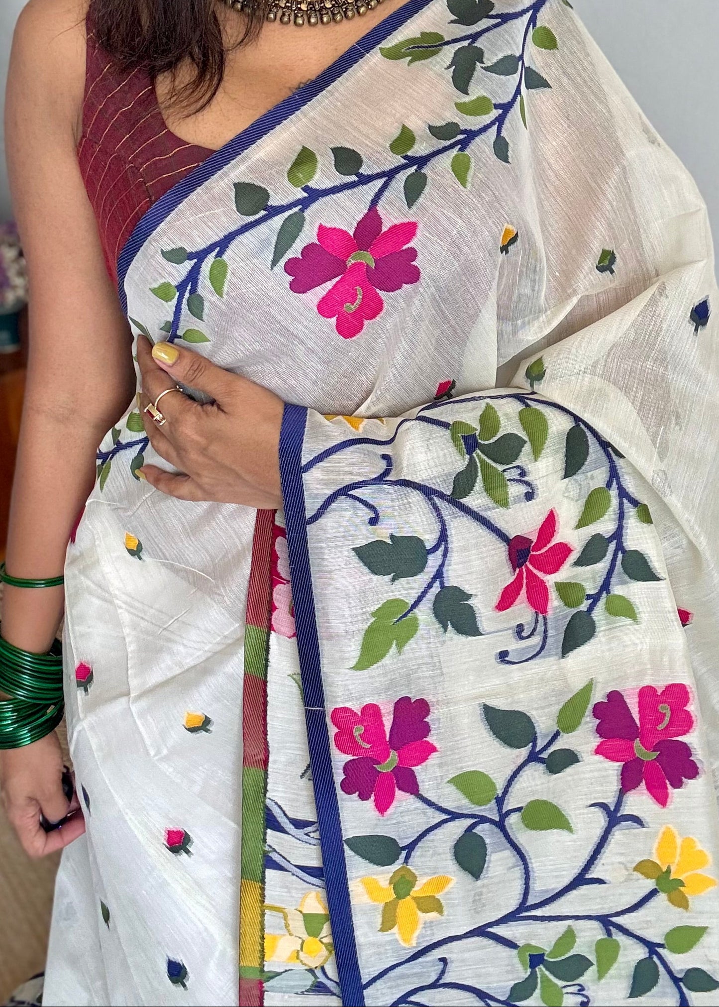 Ivory with navy blue border and multicolour floral motifs, cotton saree - YCIEBCFE325