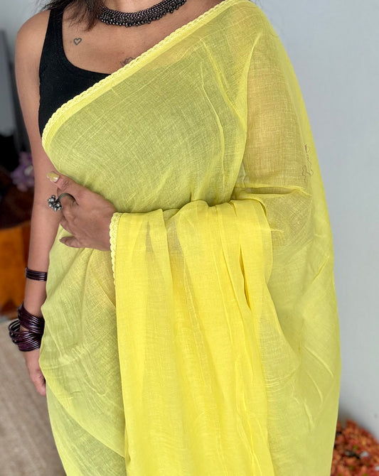 Yellow plain mul saree with lace border - YCBCMCFE402