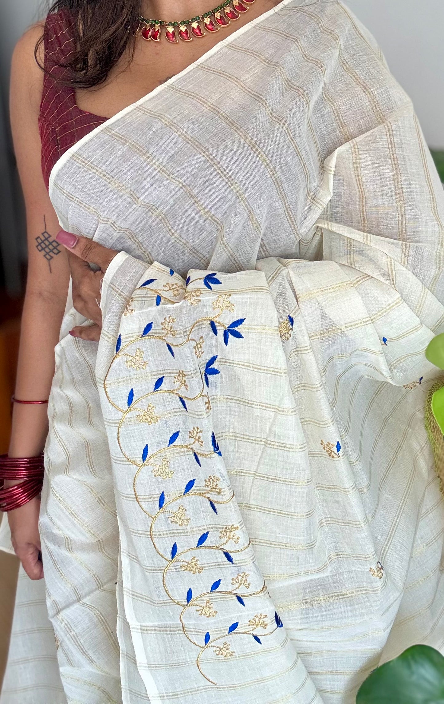 Ivory and gold soft cotton saree, blue floral vine embroidery  - YCIEON55