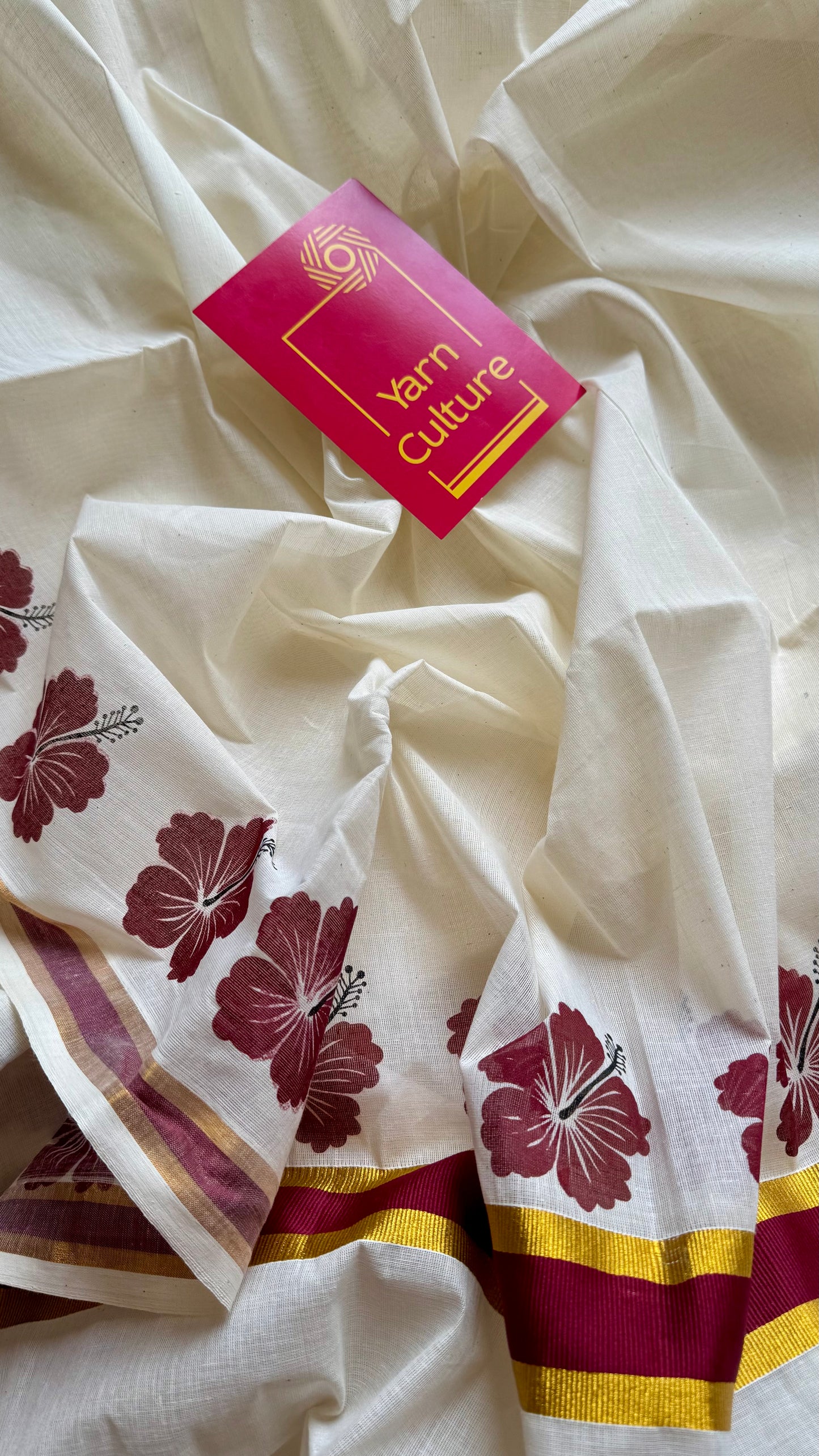 Ivory and gold soft cotton saree, maroon hibiscus (chembarathi) flowers - YCIEON62