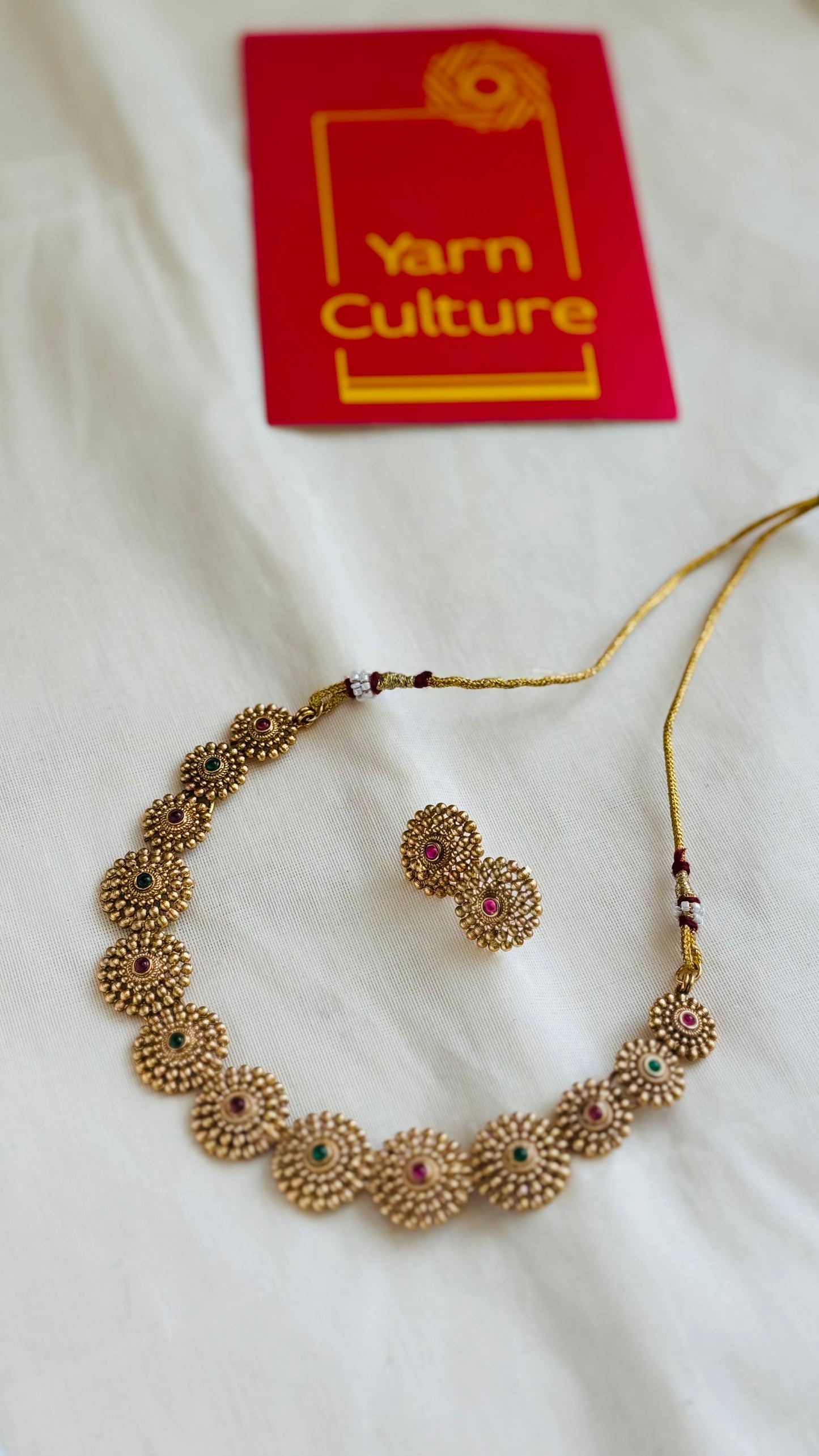 Round floral neckpiece, ruby and green stones, with earrings - YCGPNP751