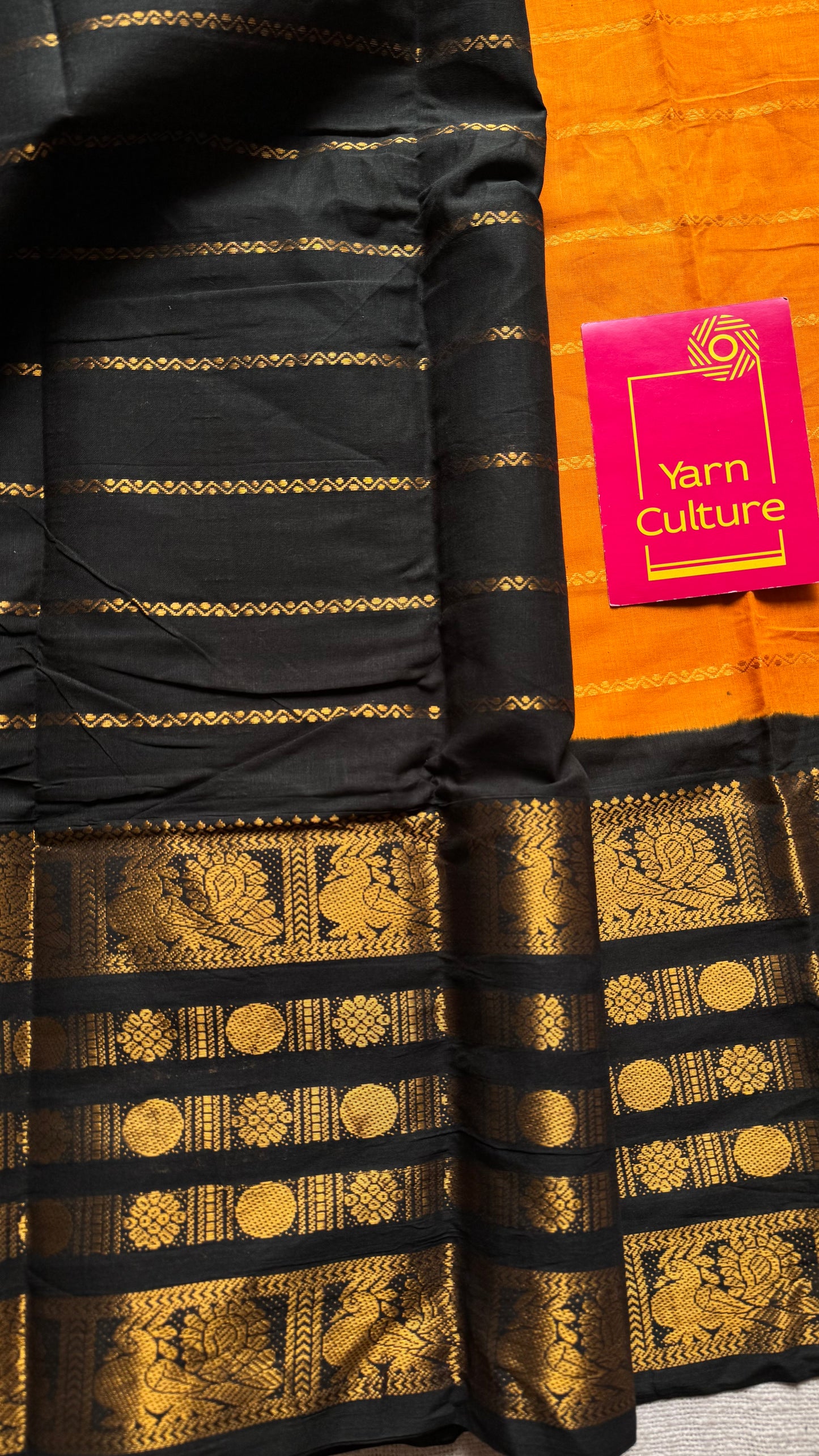 Turmeric yellow (towards orange) with black, peacock rudraksham motif, single side broad zari - madurai kattuchayam dyed - YCCOTNAURS16