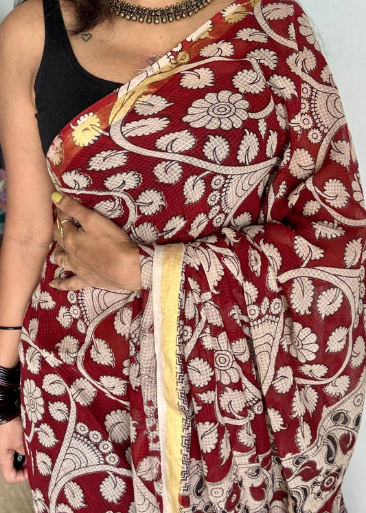 Red cream floral kalamkari saree in kota, with zari border - YCWOTDKKFE17