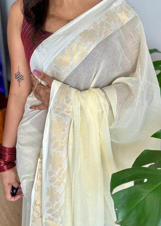 Ivory mul saree, zari flowers on border - YCIEON22