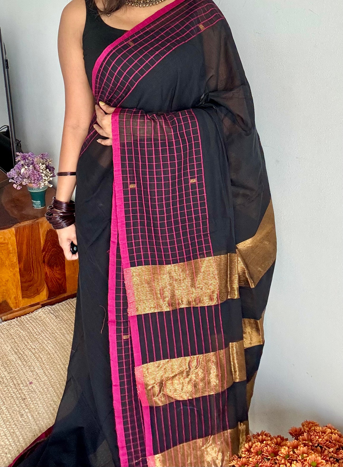 Black handloom mul saree with pink checkered borders and antique gold buttas - YCBCMCFE385