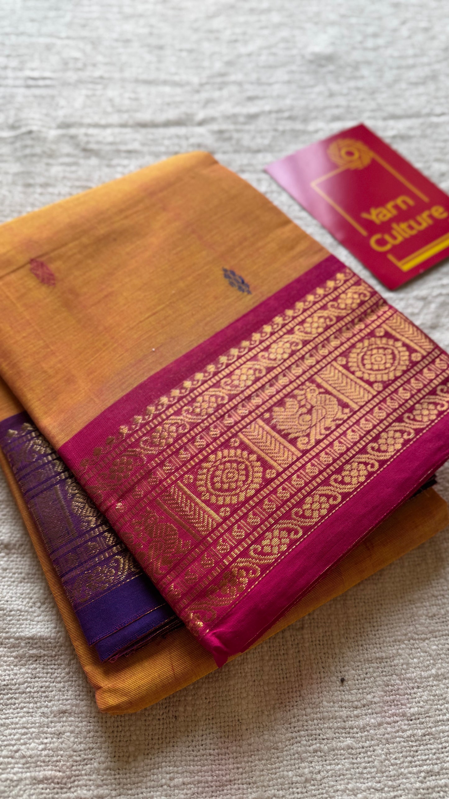 Light orange with hot pink and purple contrast, kanchi cotton saree - YCCOTNMA325